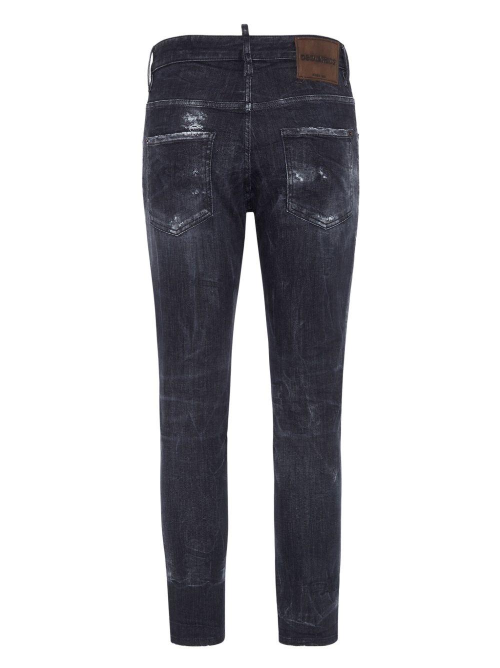 distressed stretch-cotton slim jeans Product Image