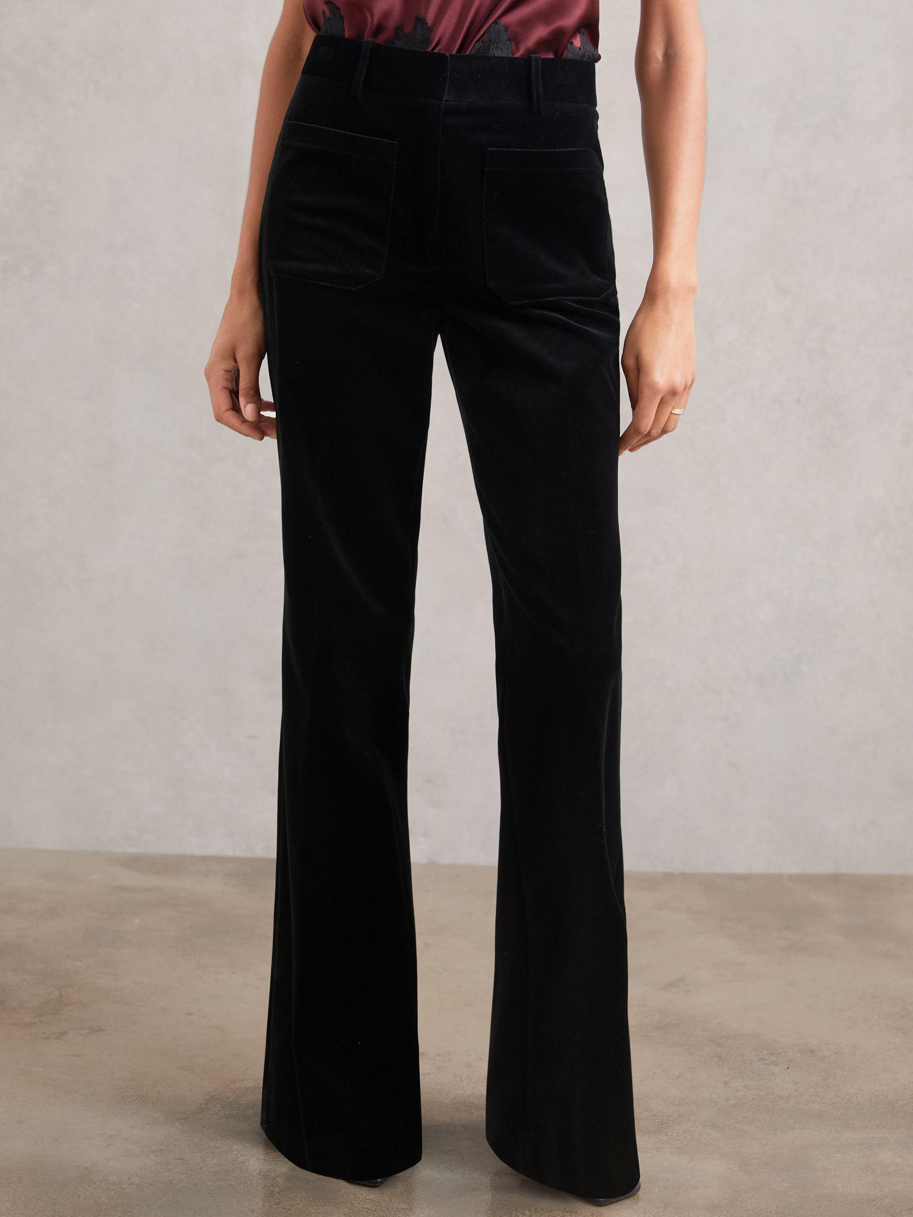 Petite Velvet Flared Trousers in Black Product Image