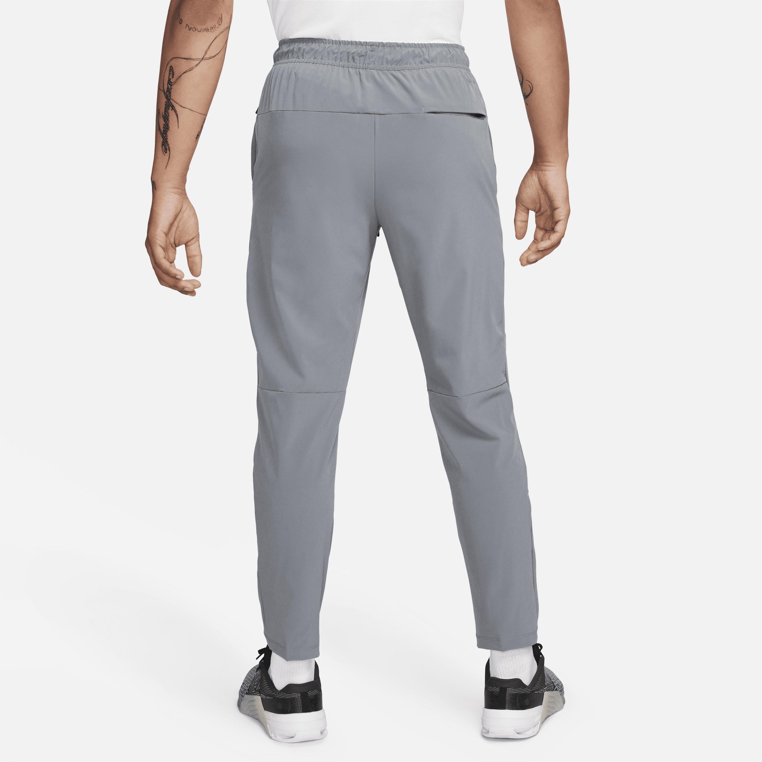 Nike Mens Unlimited Dri-FIT Tapered Leg Versatile Pants | FB7546-084 Product Image