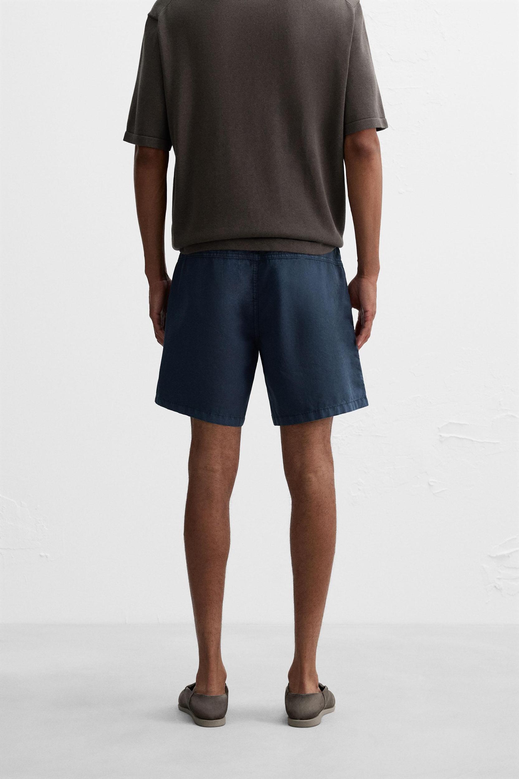 WASHED COTTON BERMUDA SHORTS Product Image