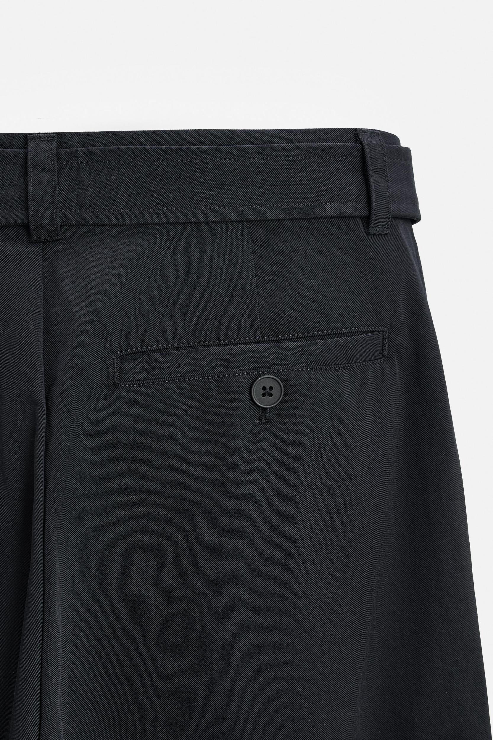 BELTED WIDE FIT PANTS Product Image