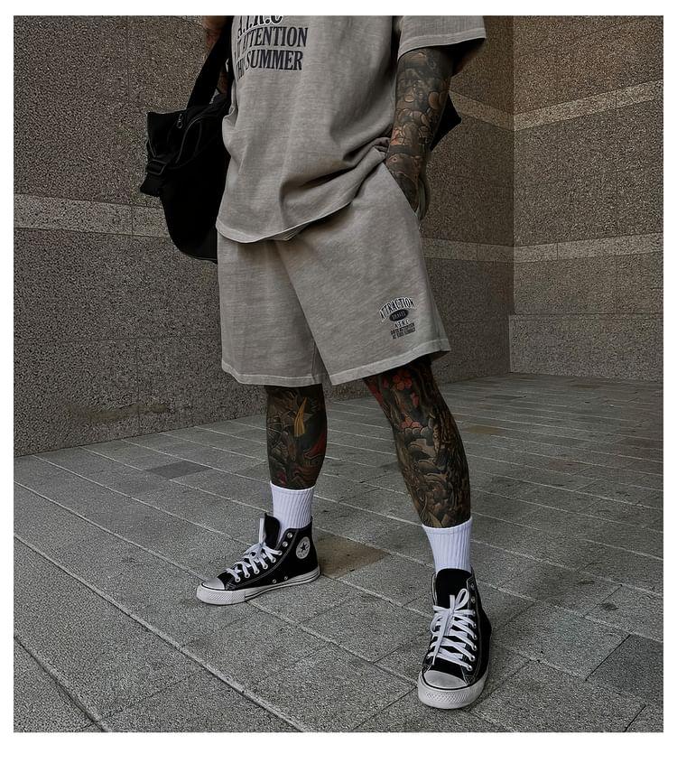 Elbow-Sleeve Crew Neck Lettering Print T-Shirt / Drawstring Waist Wide Leg Sweat Shorts Product Image