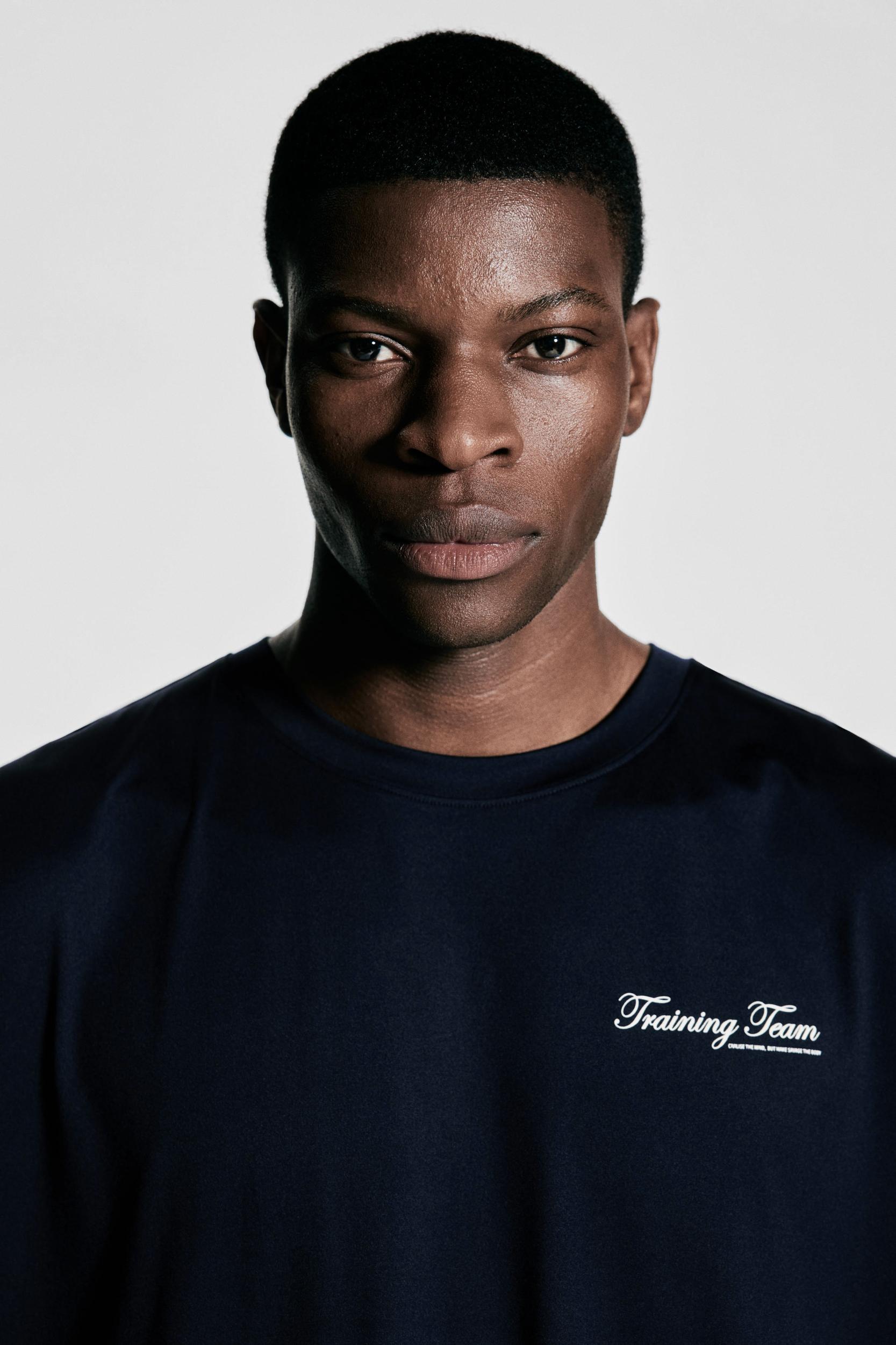 Loose-Fit Sports Tank Top with DryMove™ Product Image