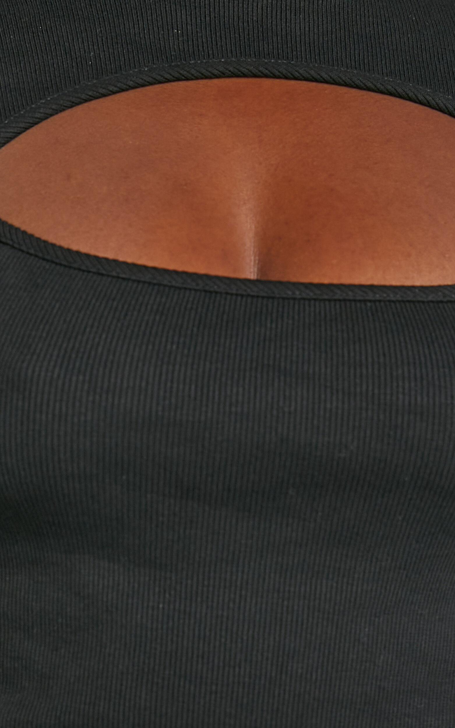 Cynlee Bodysuit - Cut Out Long Sleeve Bodysuit in Black Product Image