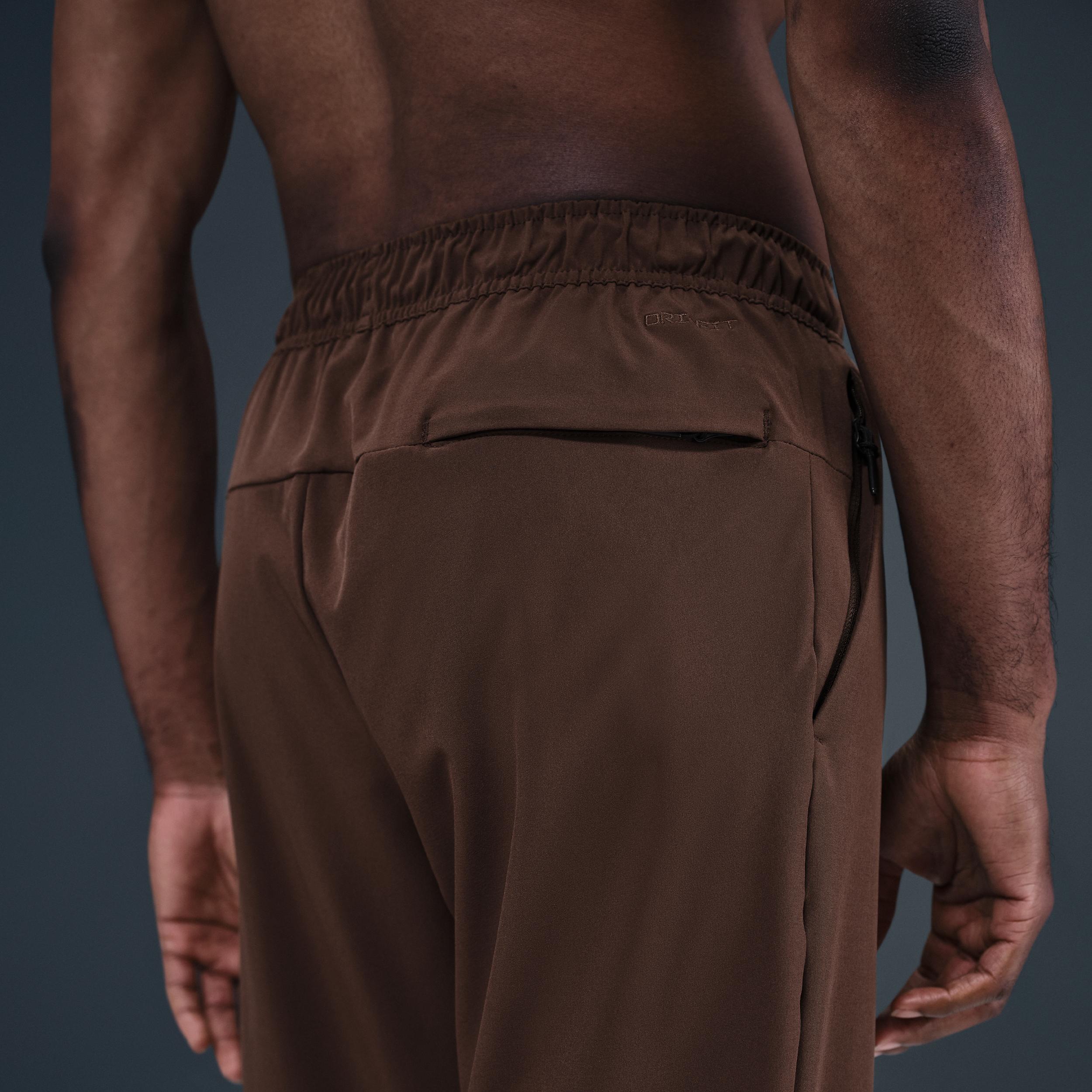 Nike Mens Unlimited Dri-FIT Tapered Leg Versatile Pants | FB7546-237 Product Image