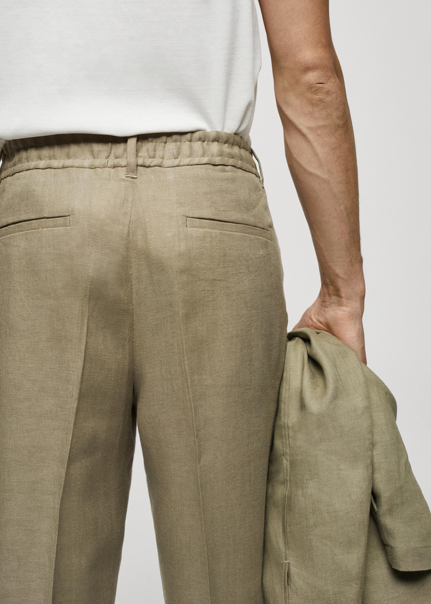 100% linen regular-fit trousers - Men | MANGO USA Product Image