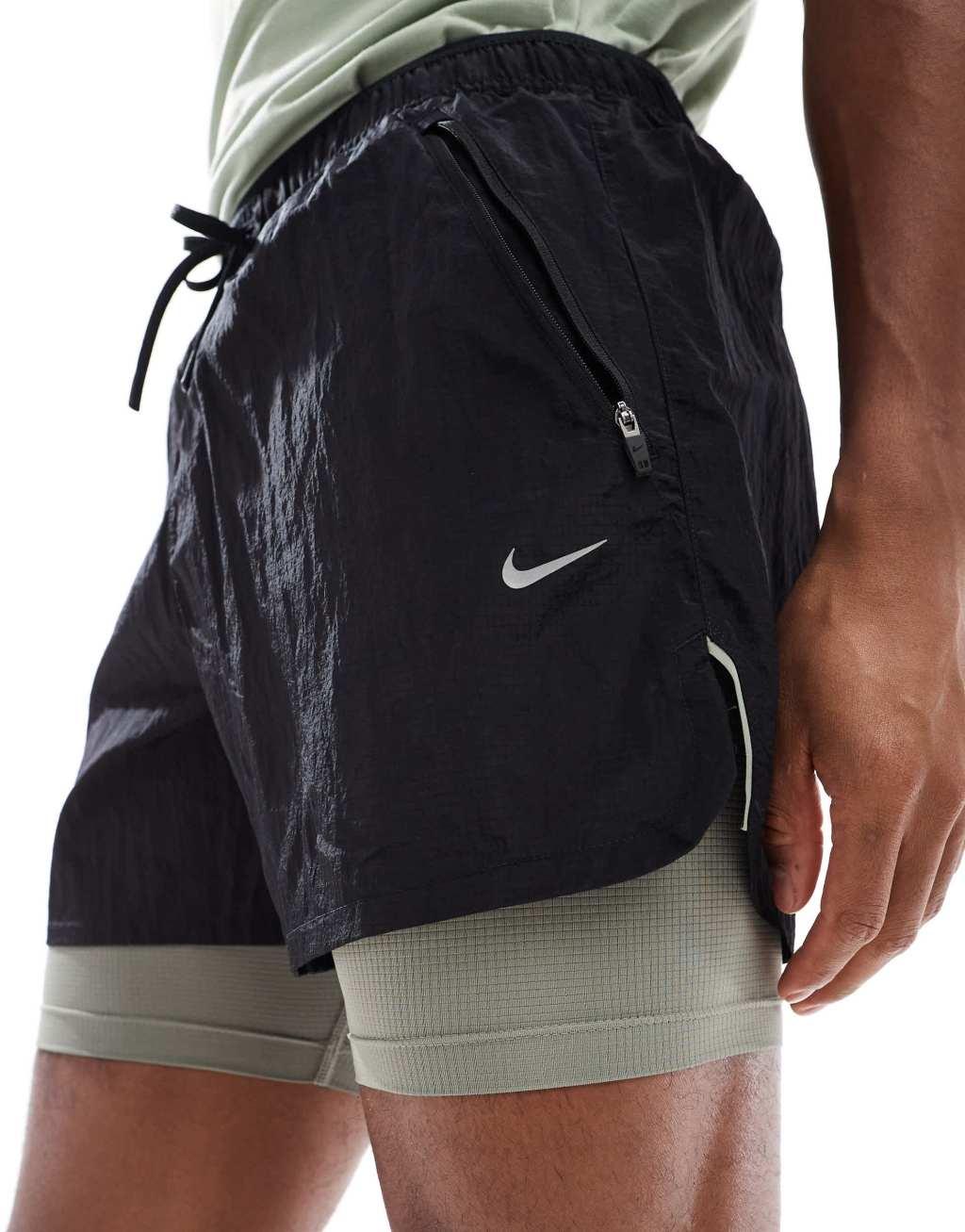 Nike Running Run Division Stride 5 inch 2 in 1 shorts in black Product Image