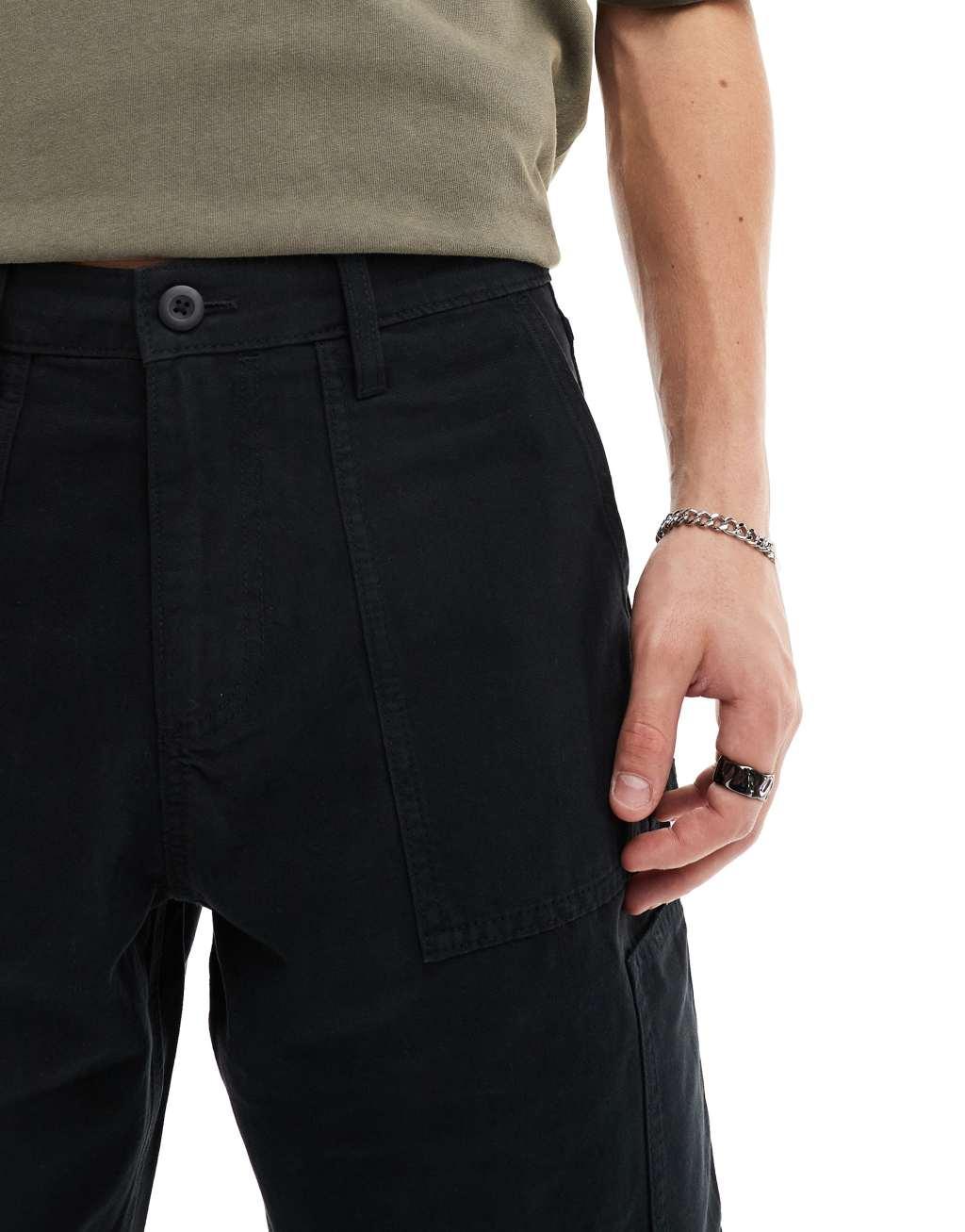 ASOS DESIGN cargo shorts in black with carpenter detail Product Image