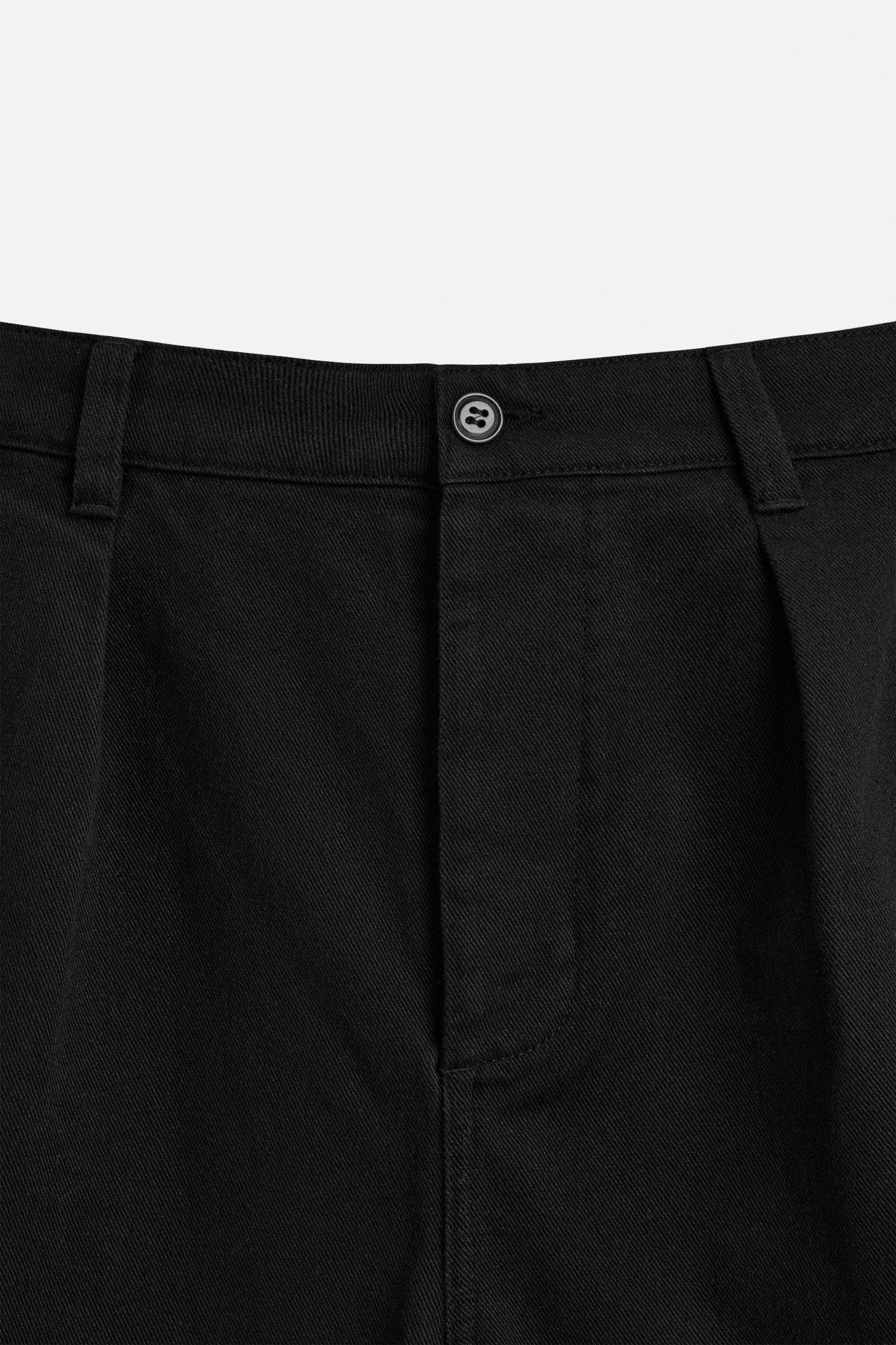 RELAXED FIT PLEATED BERMUDA SHORTS Product Image