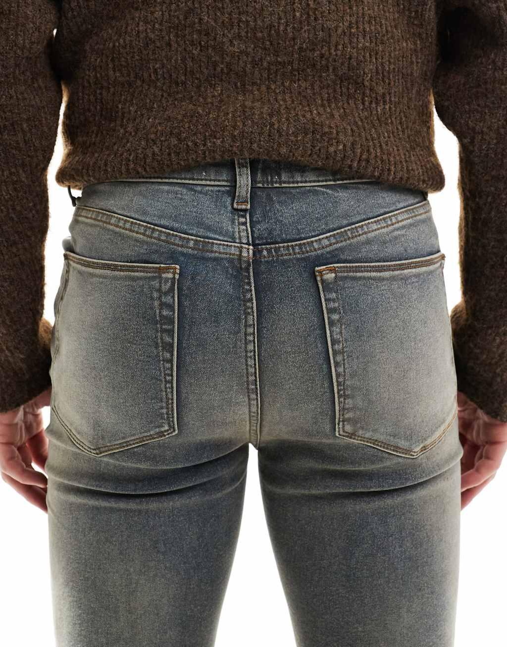 ASOS DESIGN spray on jeans with power stretch in tinted dark wash blue  Product Image