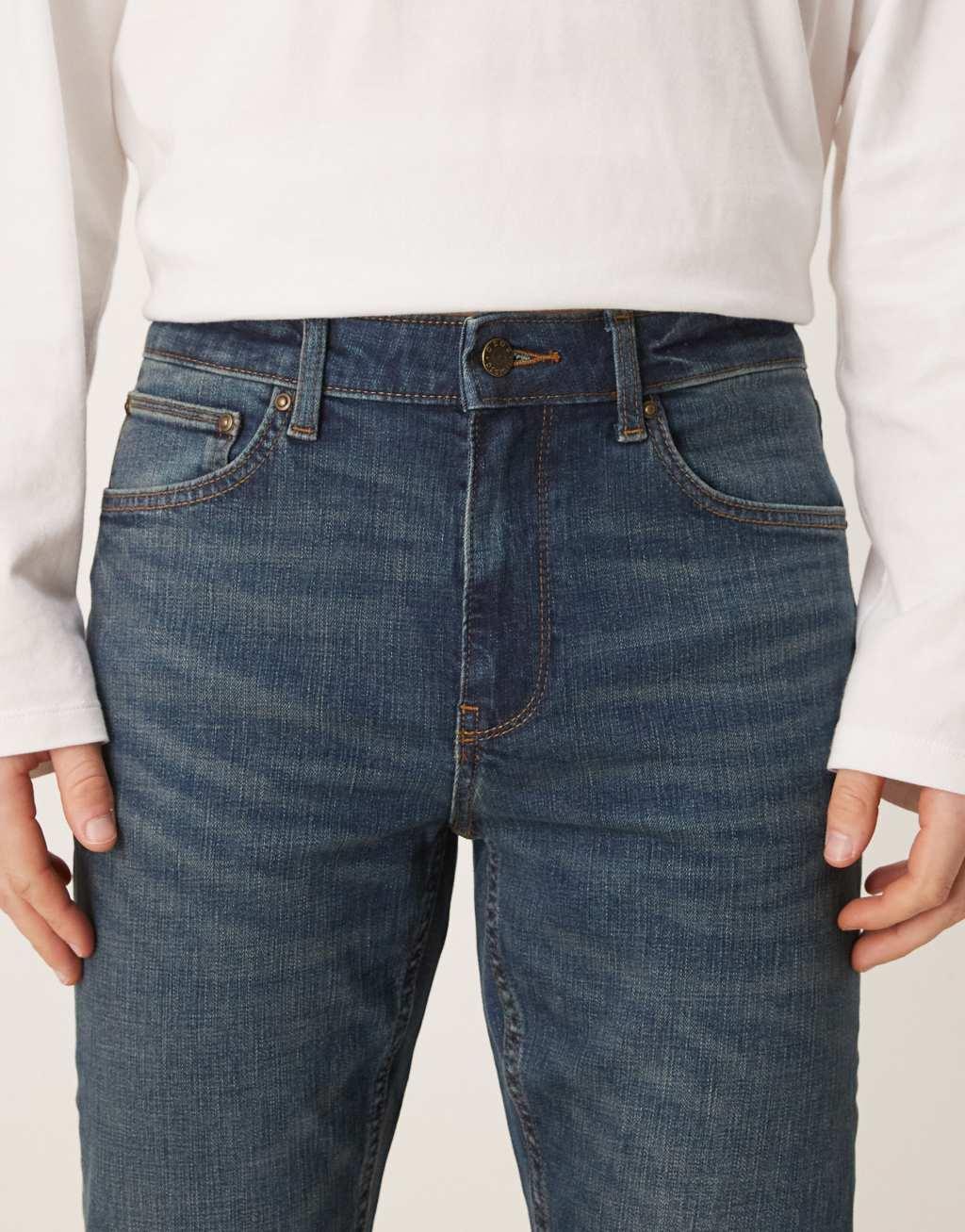 ASOS DESIGN stretch flare jeans in dark wash blue Product Image