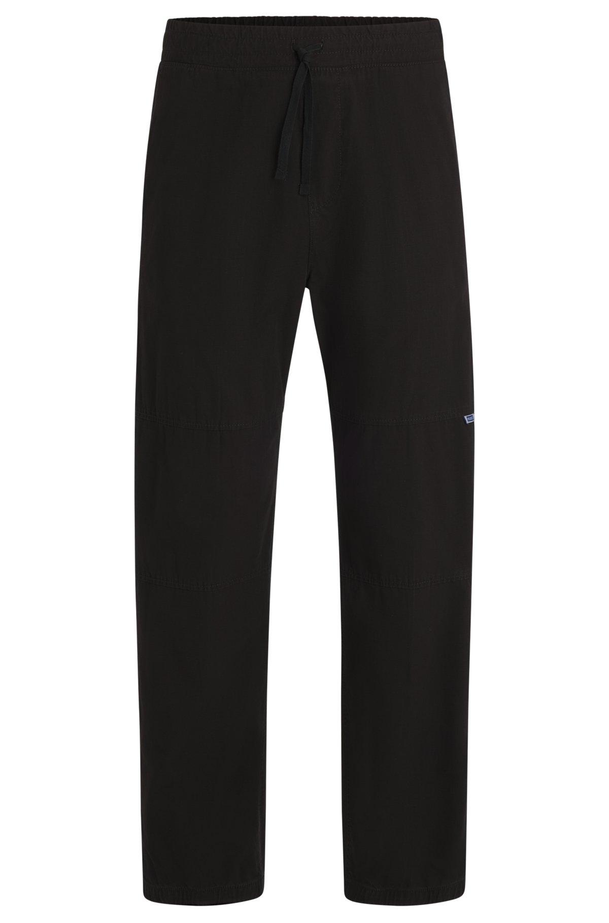 Tapered-fit tracksuit bottoms in ripstop cotton Product Image