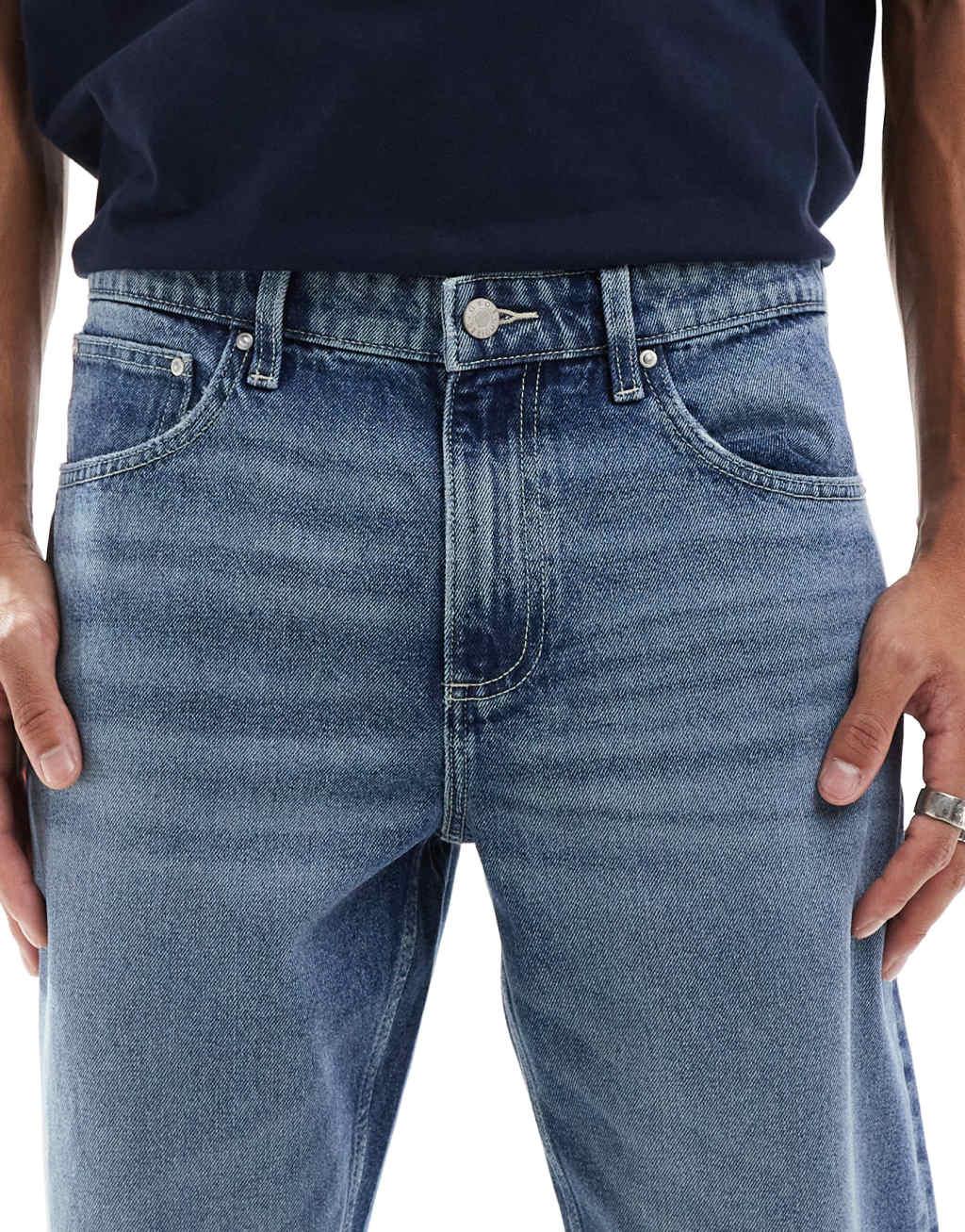 ASOS DESIGN tapered fit jeans in mid wash blue | ASOS Product Image