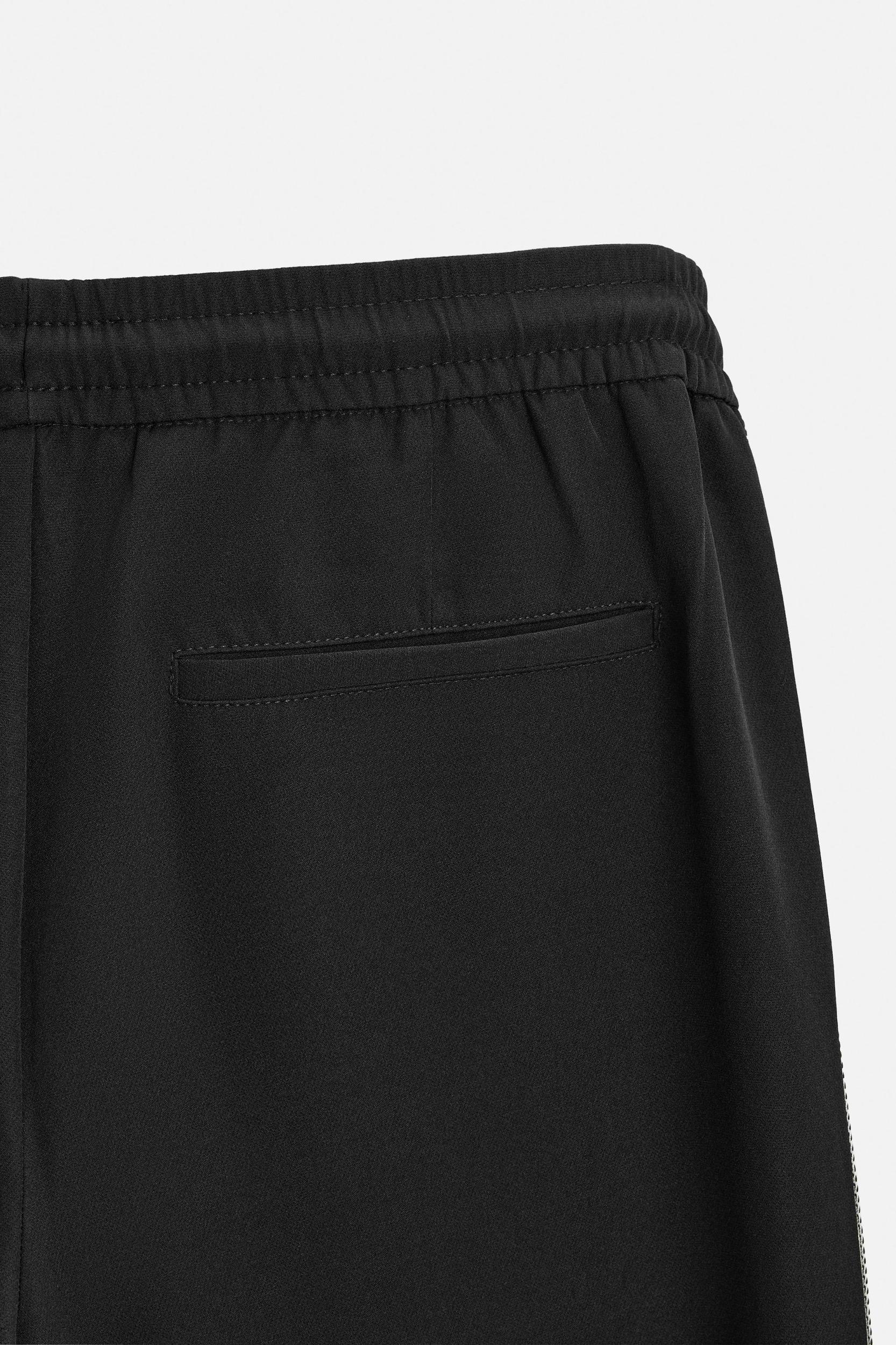 TECHNICAL PANTS WITH BANDS Product Image