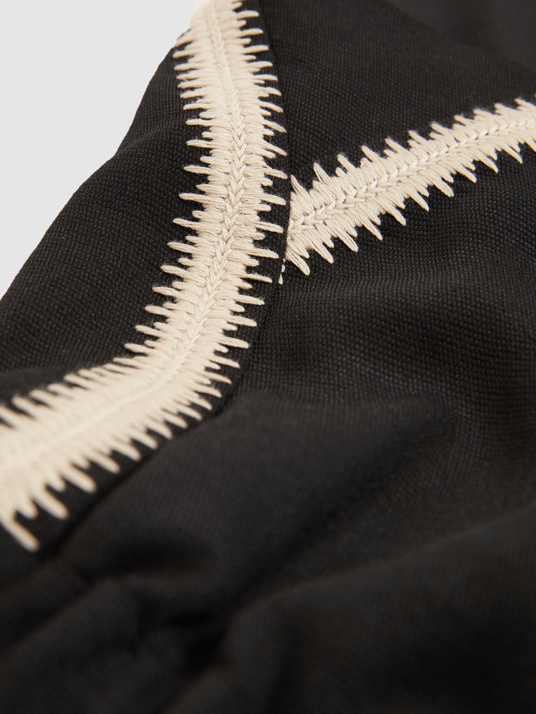 Halterneck Craft Stitch Jumpsuit in Black Product Image