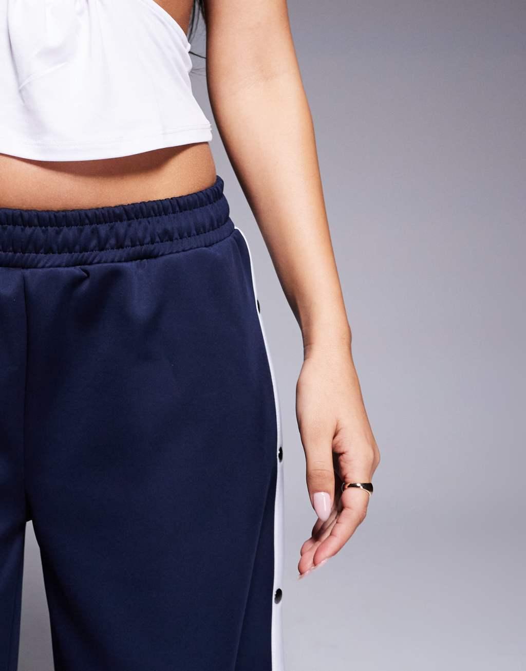 ASOS DESIGN wide leg pants with stripe and snaps in navy Product Image