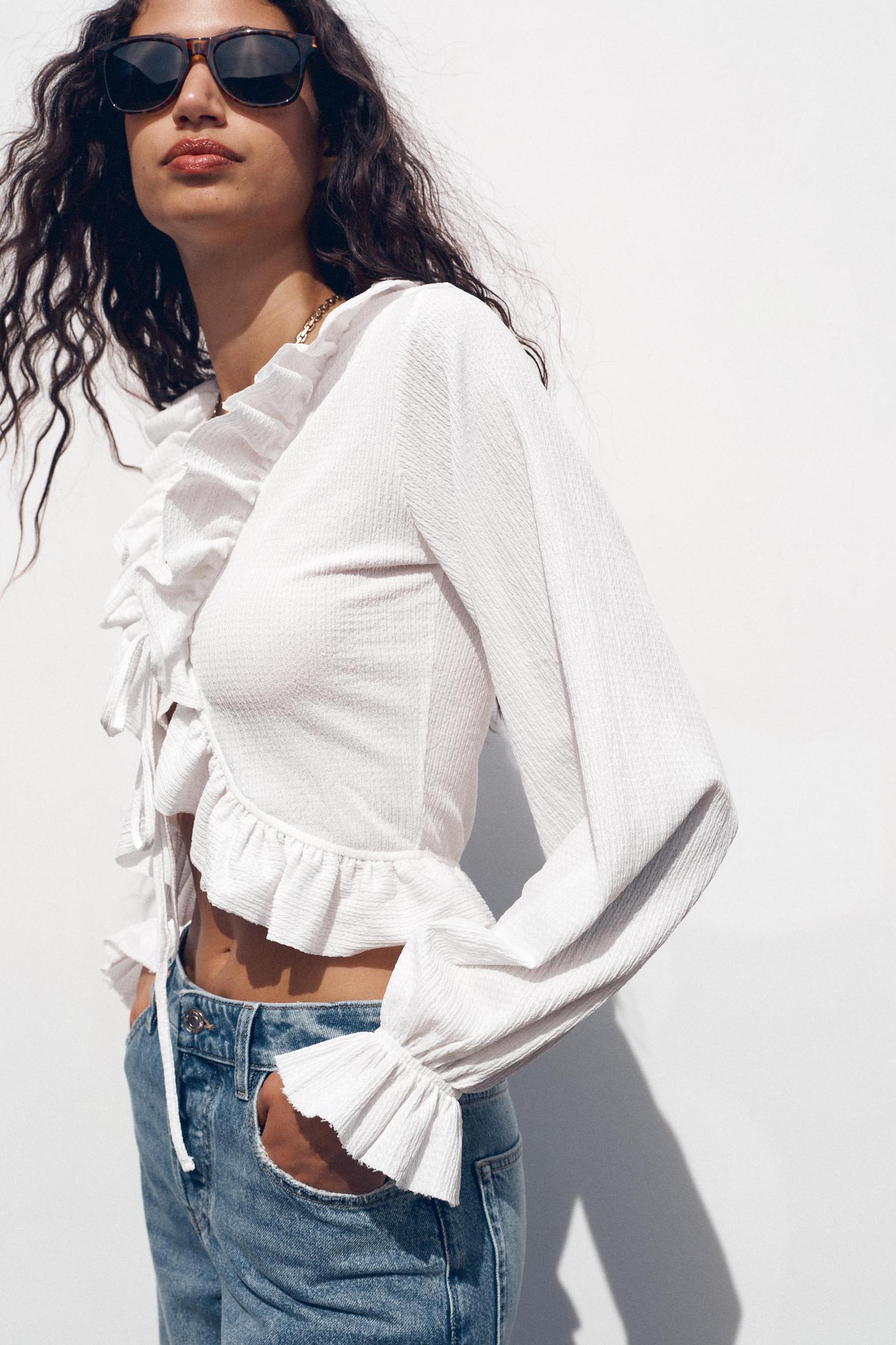 RUFFLED V-NECK TOP Product Image