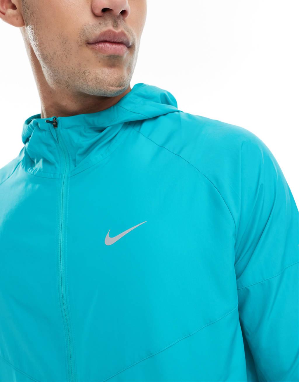 Nike Running Miler jacket in light blue Product Image