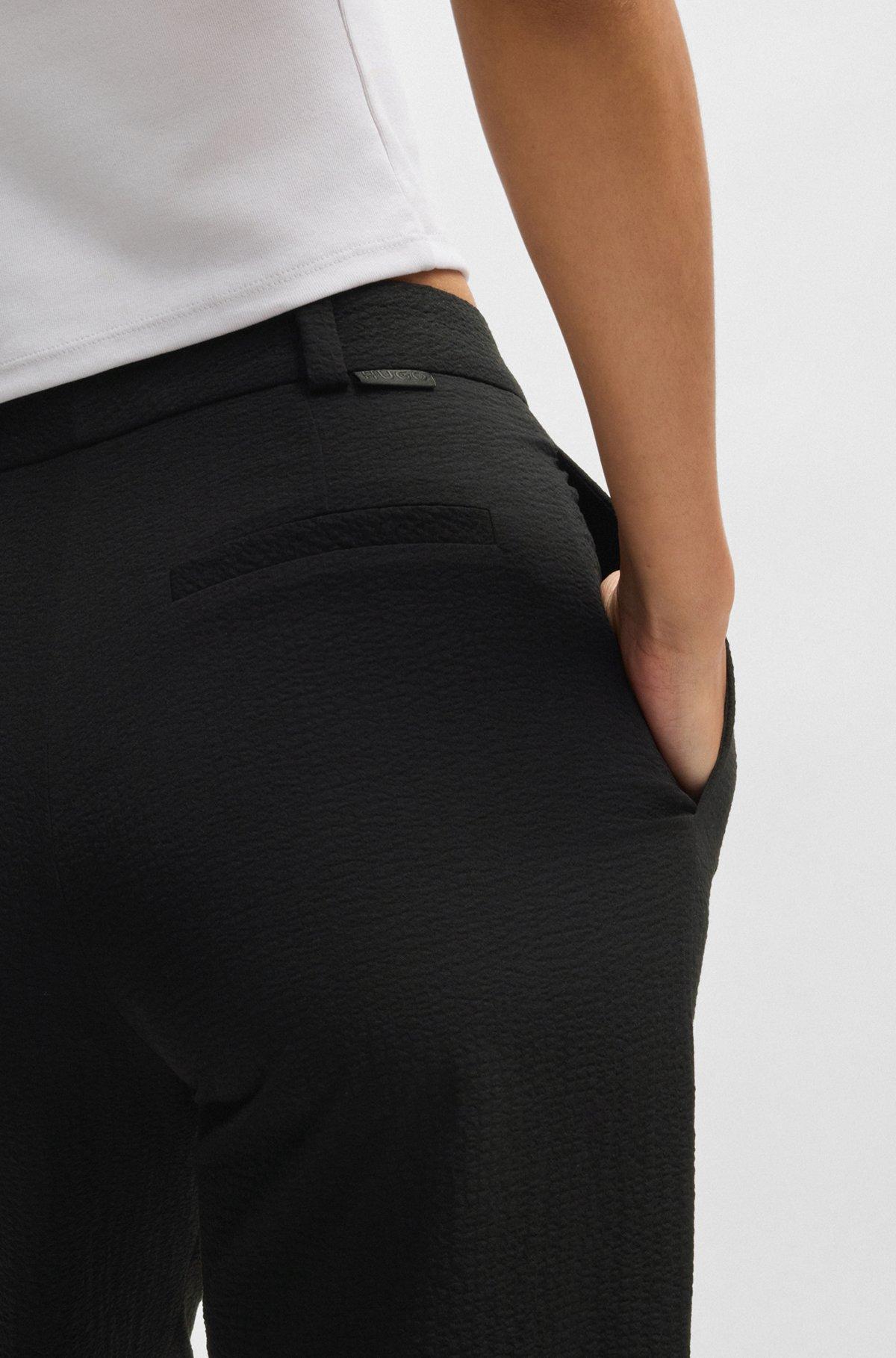 HUGO - Regular-fit trousers in stretch seersucker - Black Product Image