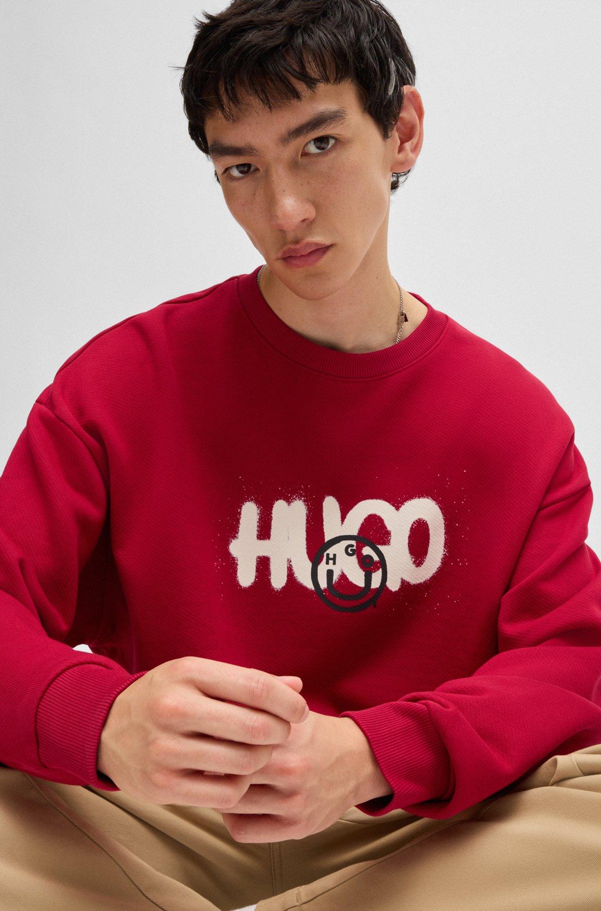 Cotton-terry sweatshirt with Happy HUGO logo Product Image