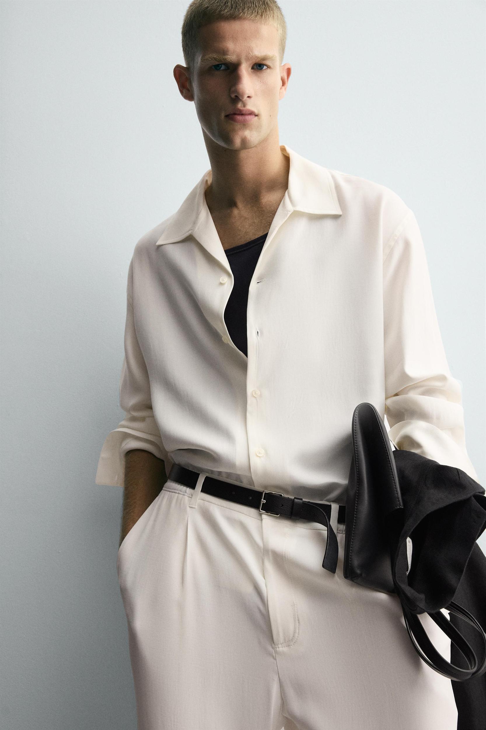 RELAXED FIT PLEATED PANTS Product Image