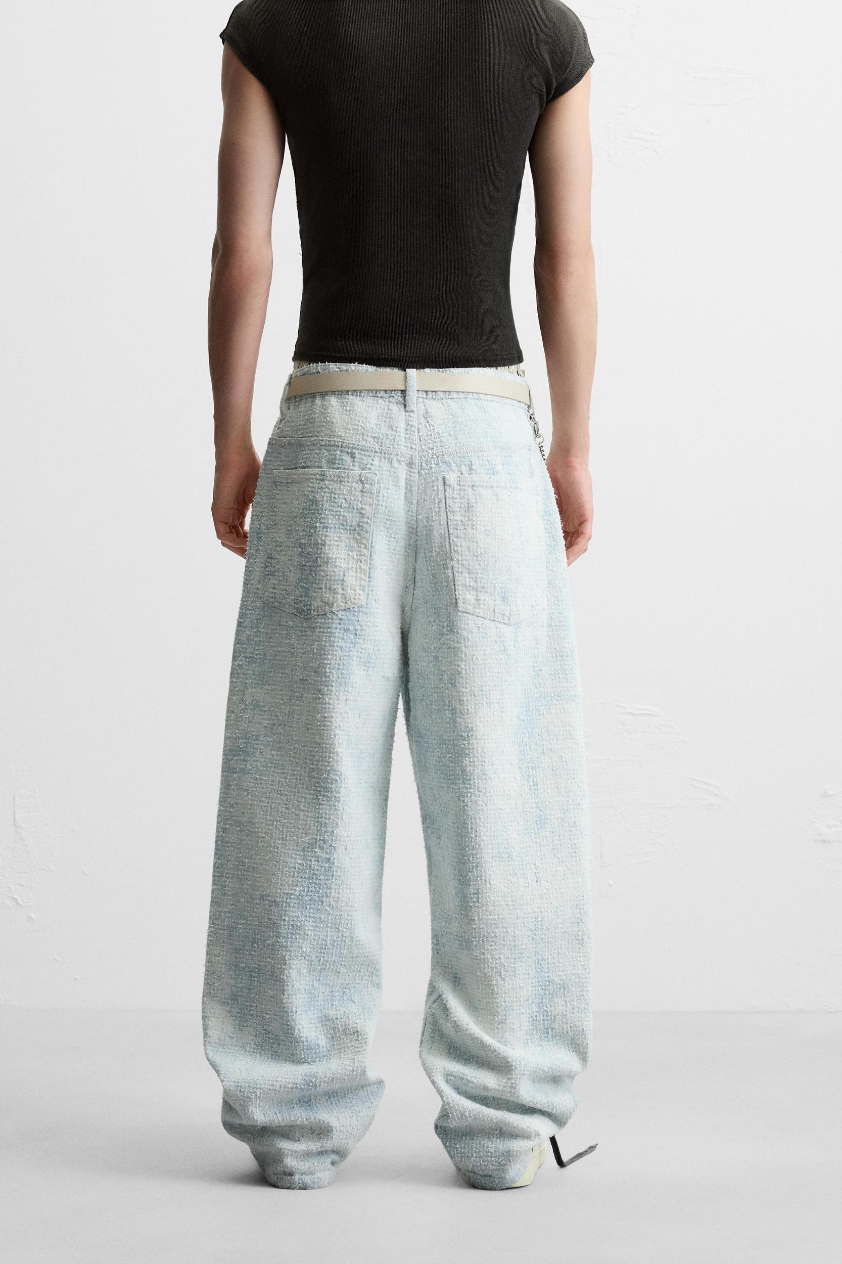 DISTRESSED FINISH BAGGY FIT JEANS Product Image