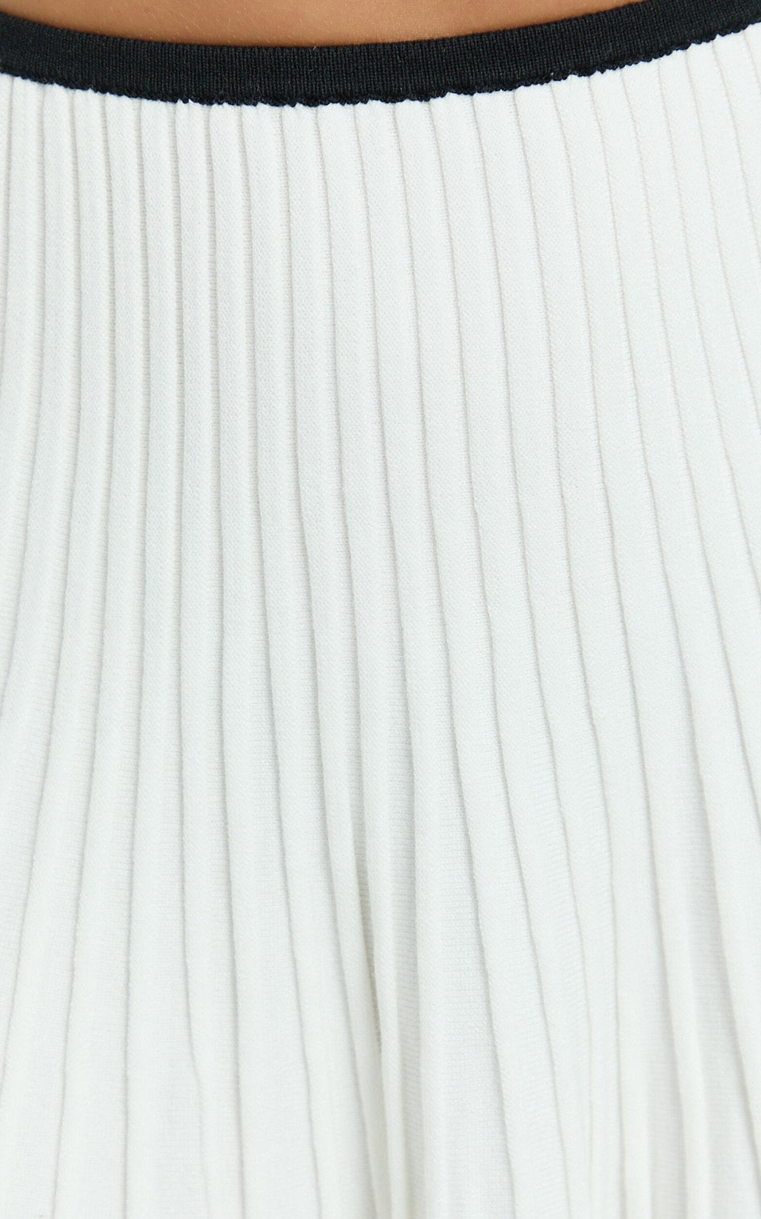 Naomi Two Piece Set - Contrast Knit Button Up Long Sleeve And Pleated Mini Skirt in Cream Product Image