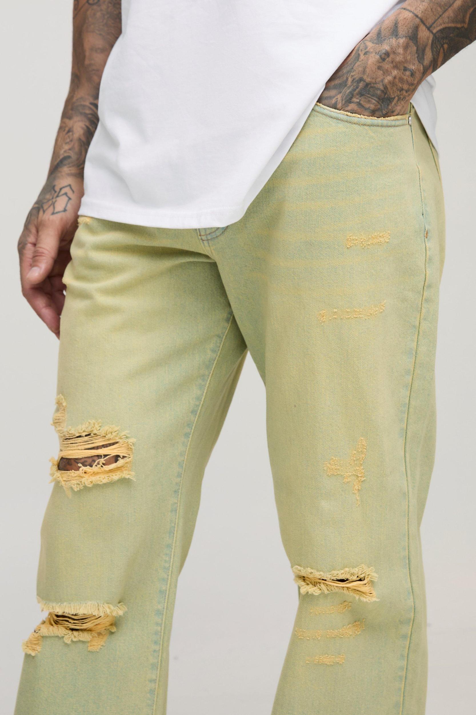 Tall Relaxed Rigid Flare Stacked Knee Rip Denim Jeans | boohooMAN USA Product Image