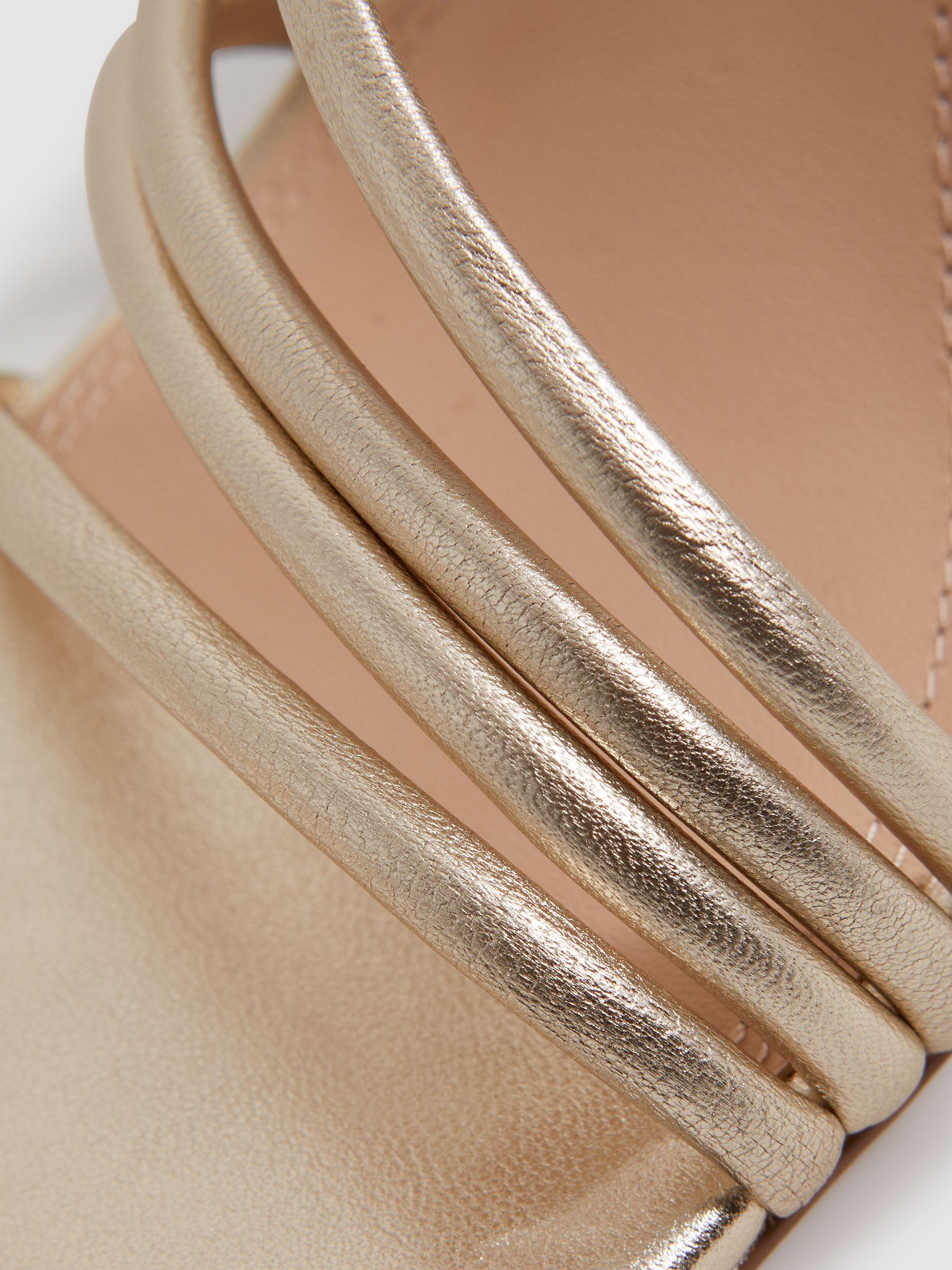 Leather Strappy Wedge Heels in Gold Product Image