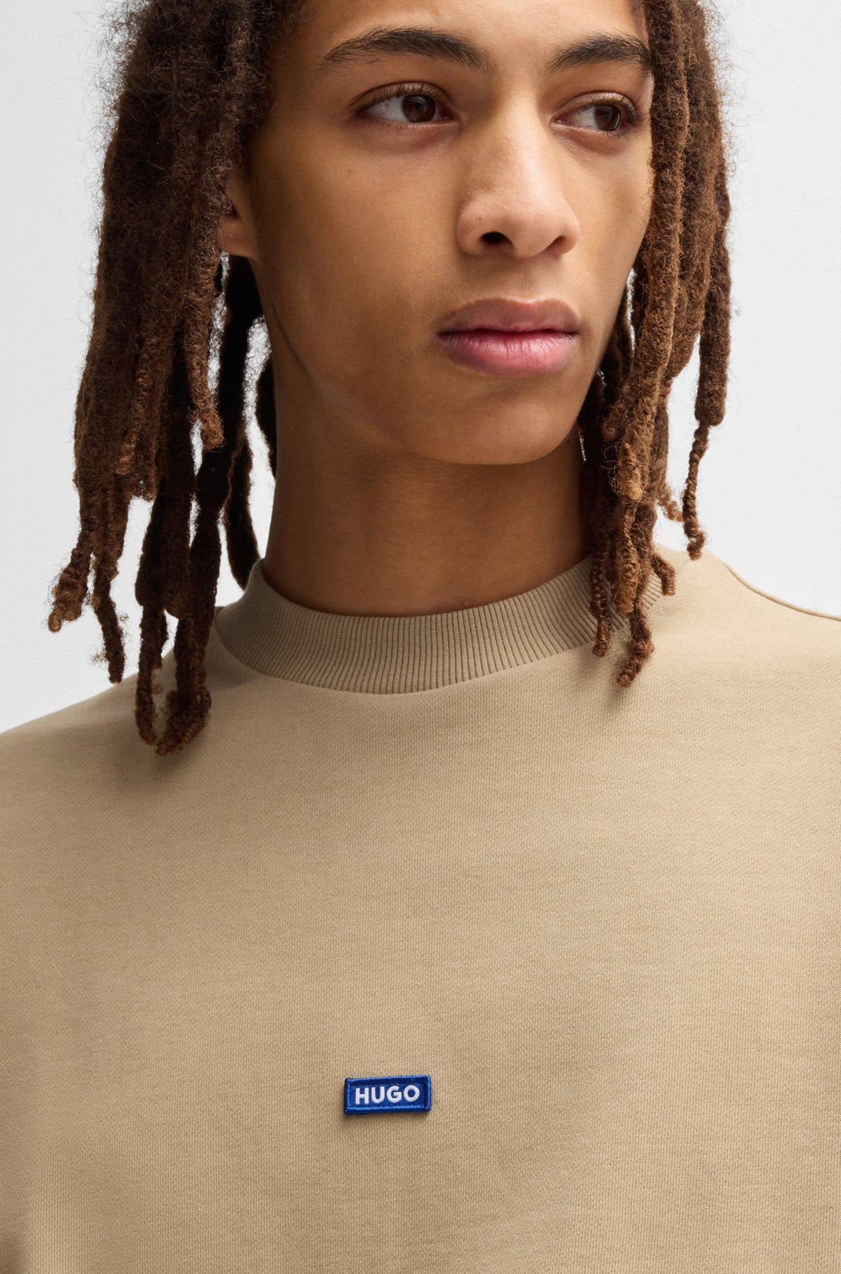 Cotton-terry sweatshirt with blue logo patch Product Image