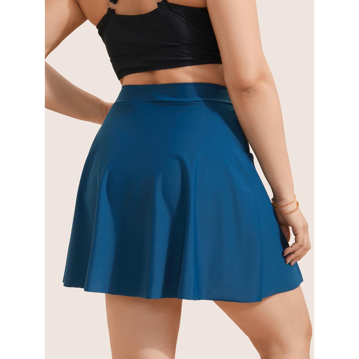 Plus Size Solid Patched Pocket Side Pleated Swim Skirt Women's Swimwear Indigo Beach Non High stretch Bodycon High Rise Slanted pocket Curve Swim Bottoms BloomChic 30/6X Product Image