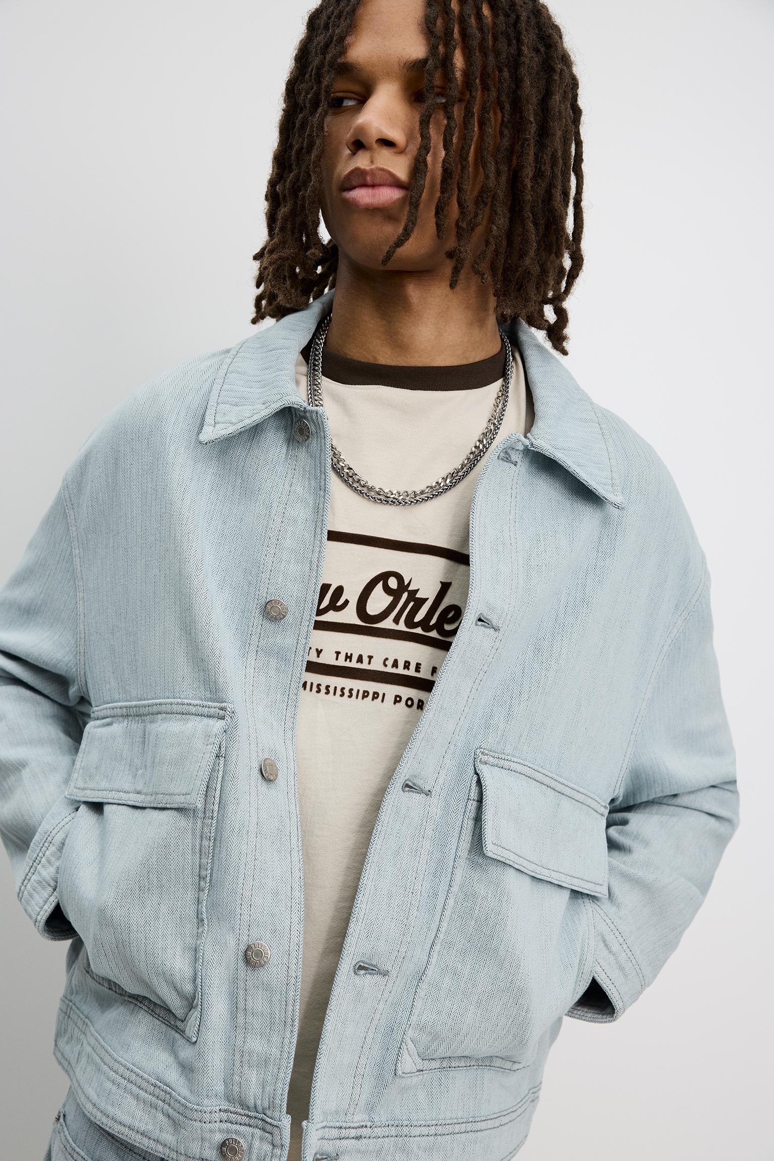 Denim jacket with pockets Product Image