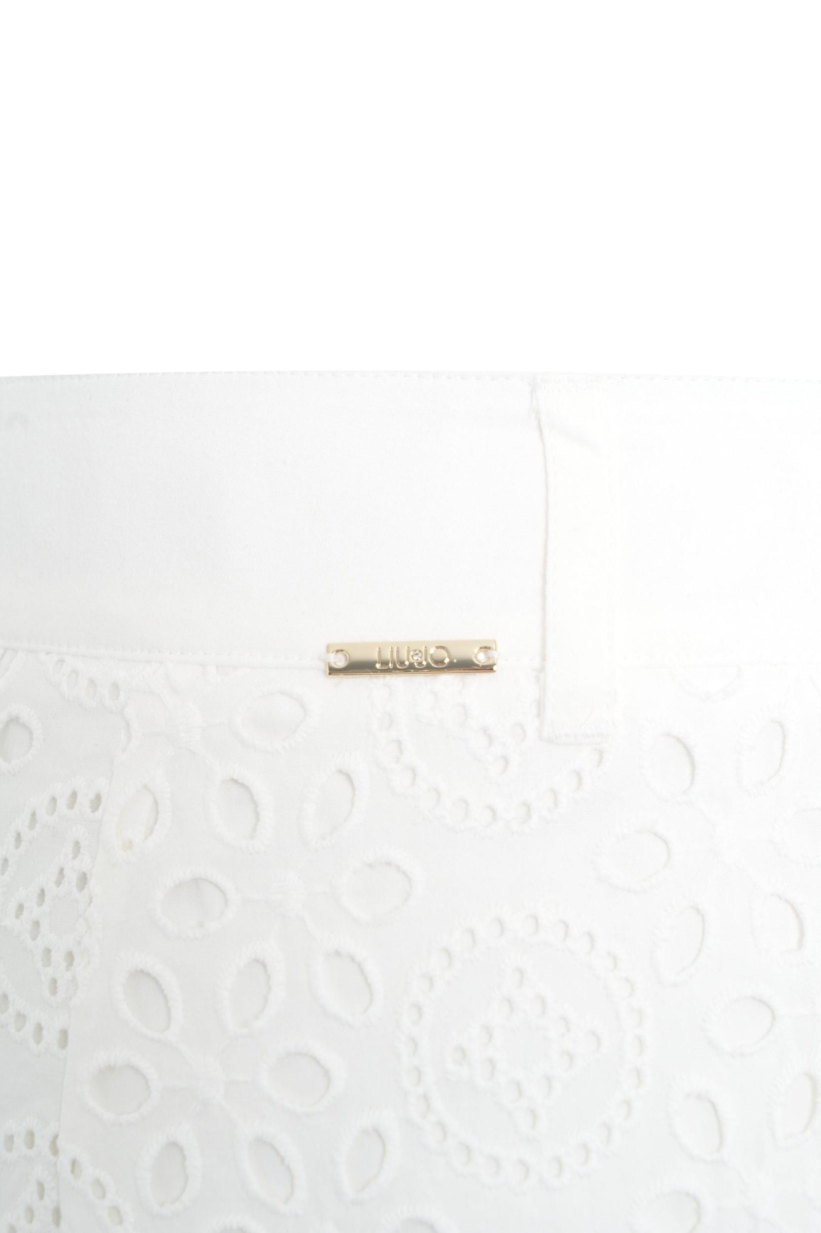 Pants with perforated embroidery Product Image