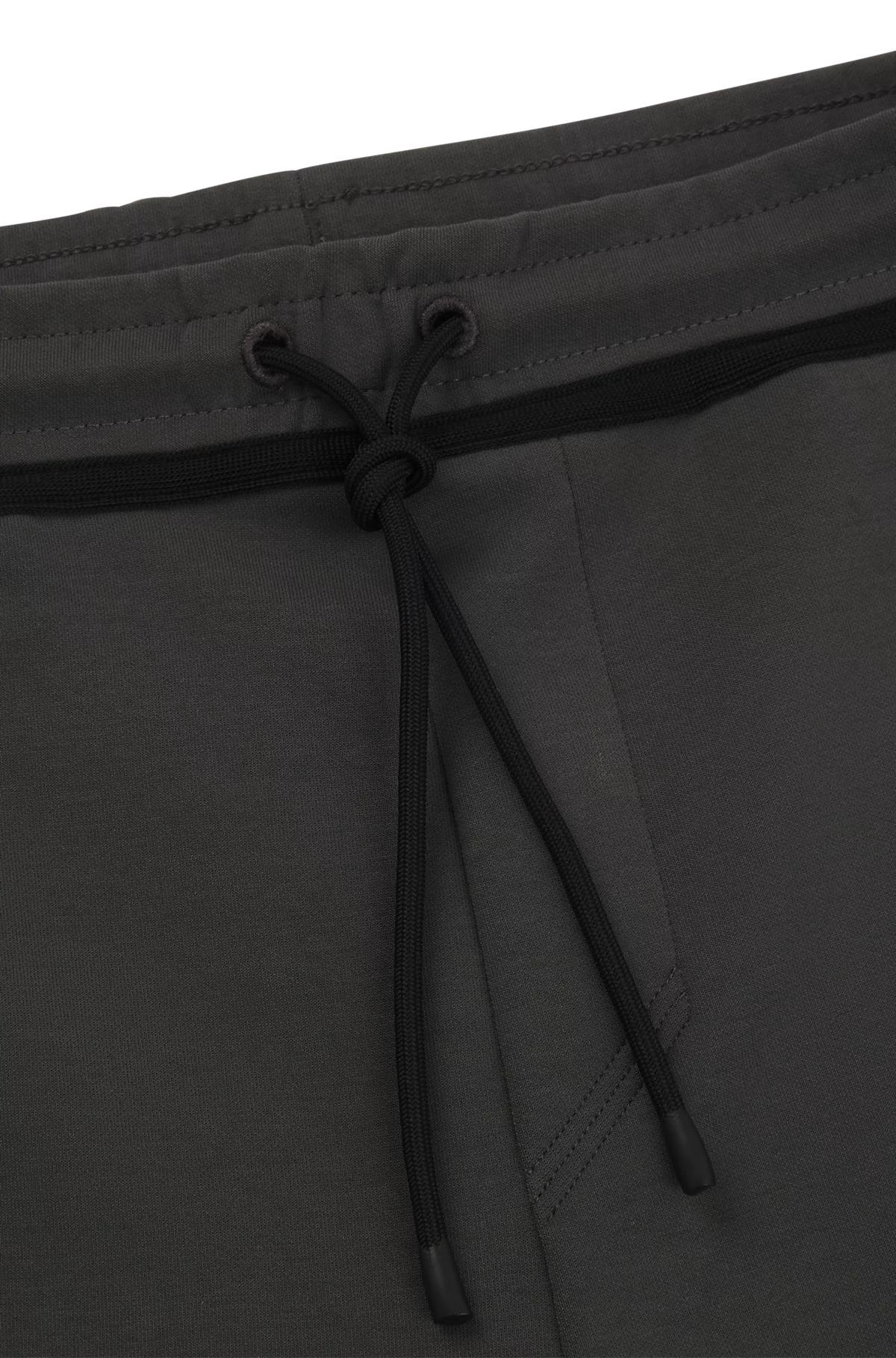 Tracksuit bottoms with tape and logo Product Image