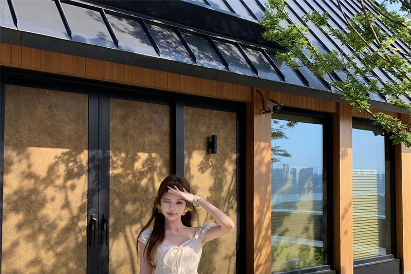 Cap Sleeve Sweetheart Neck Plain Bow Embroidered Eyelet Blouse / High Waist Wide Leg Pants Product Image