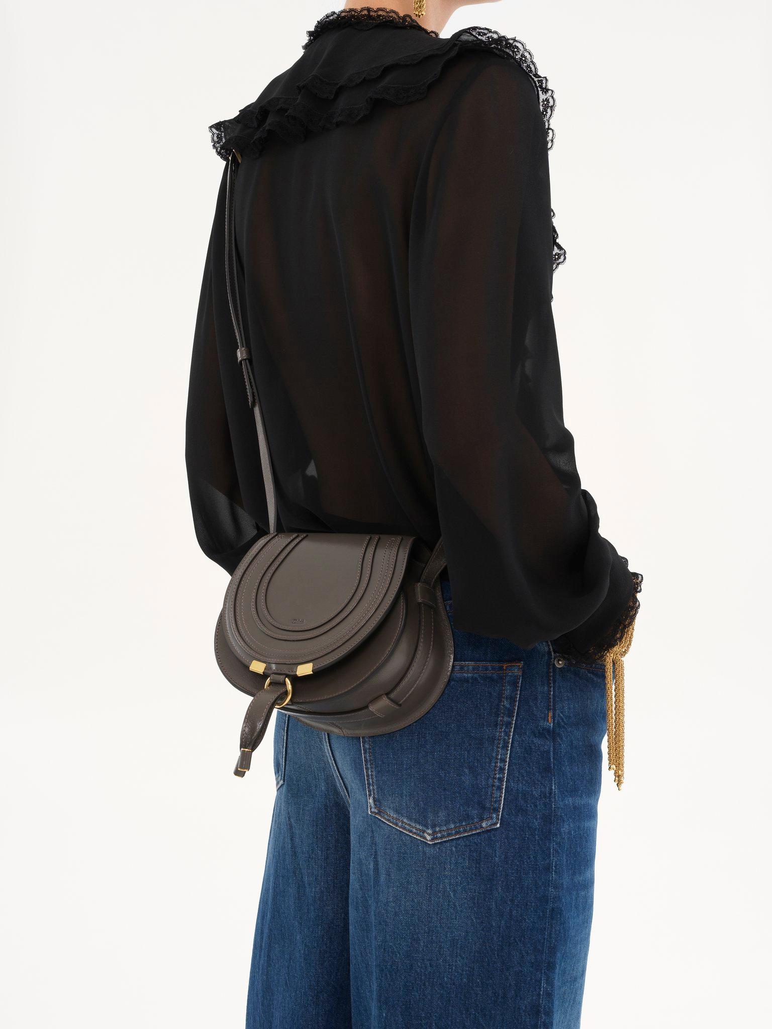 Small Marcie saddle bag in shiny leather Product Image