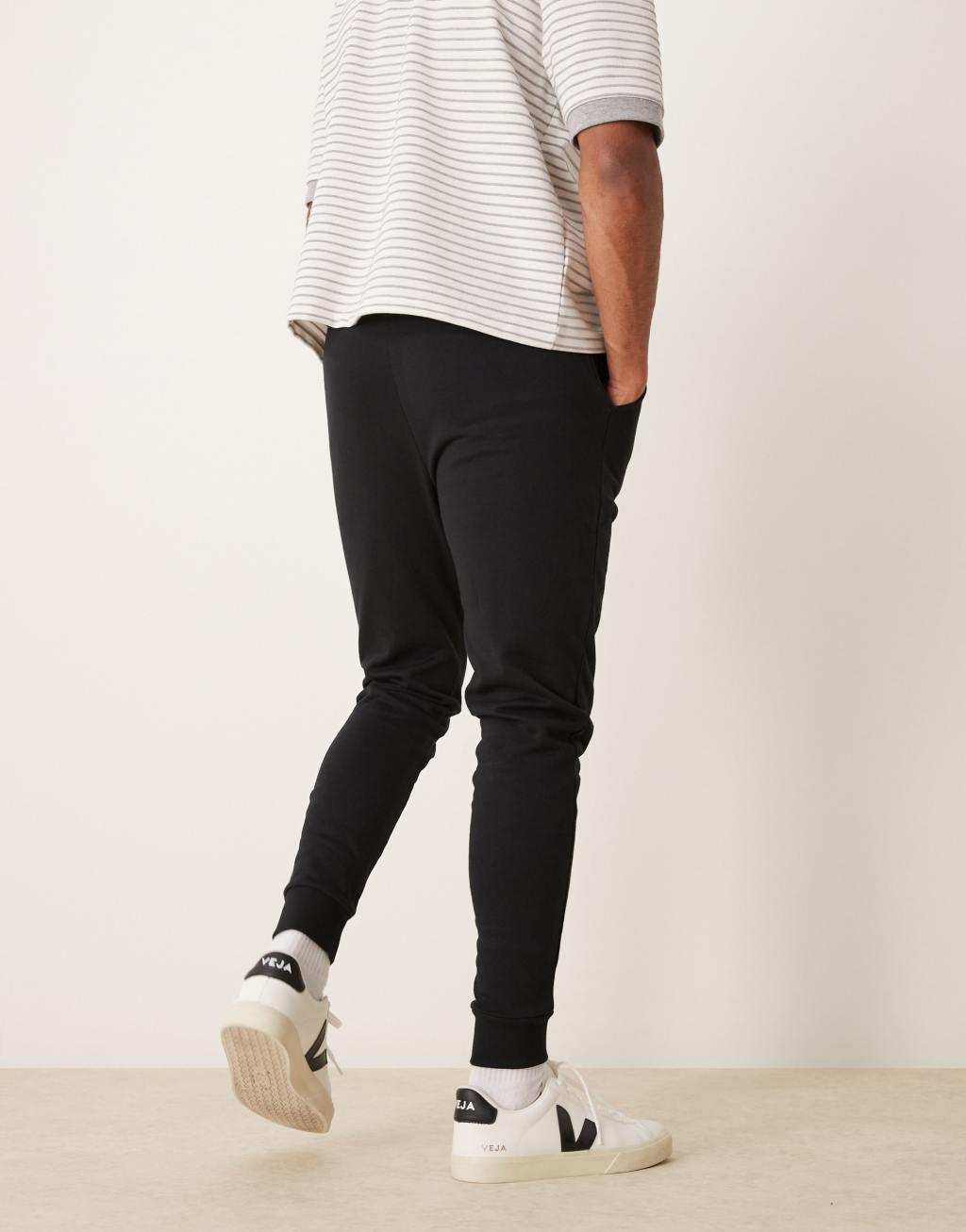 ASOS DESIGN essential skinny sweatpants in black Product Image