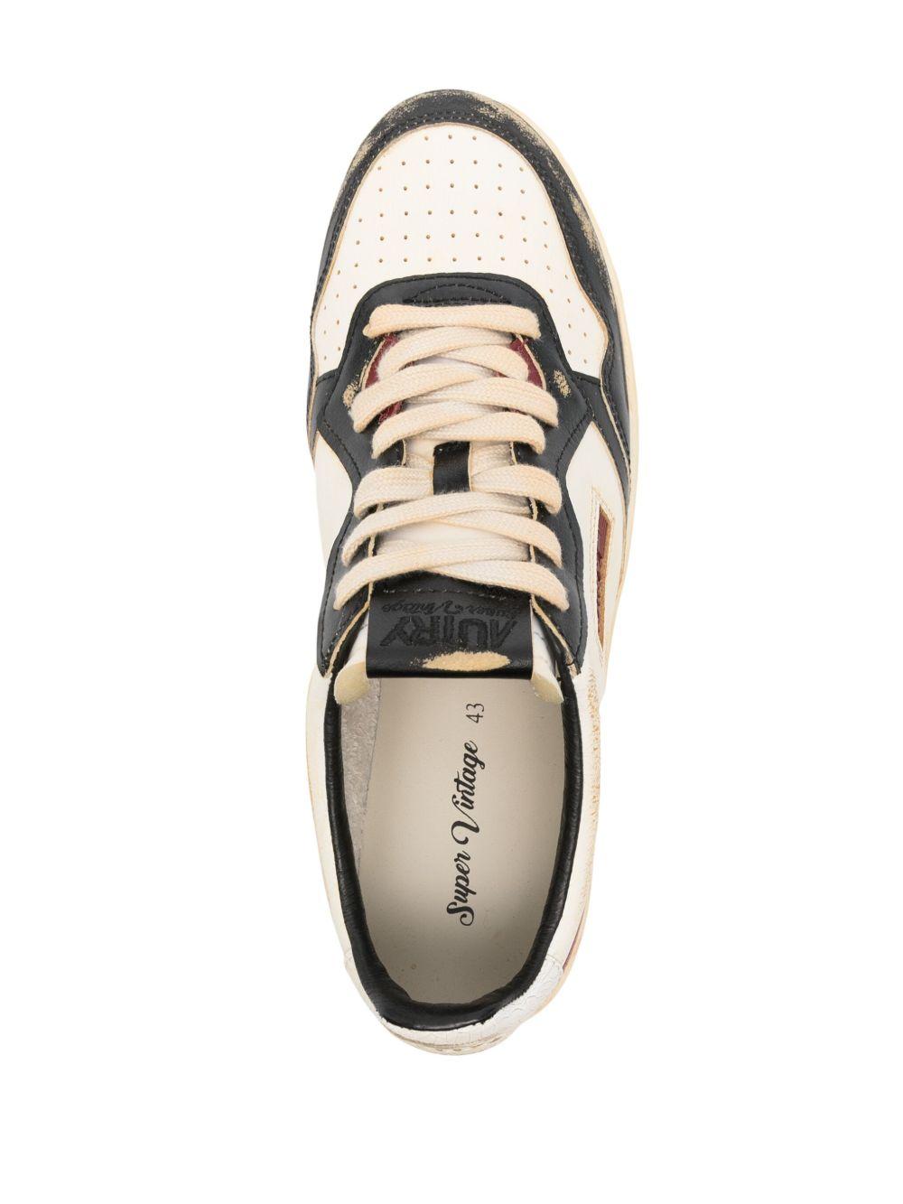 Action leather sneakers Product Image