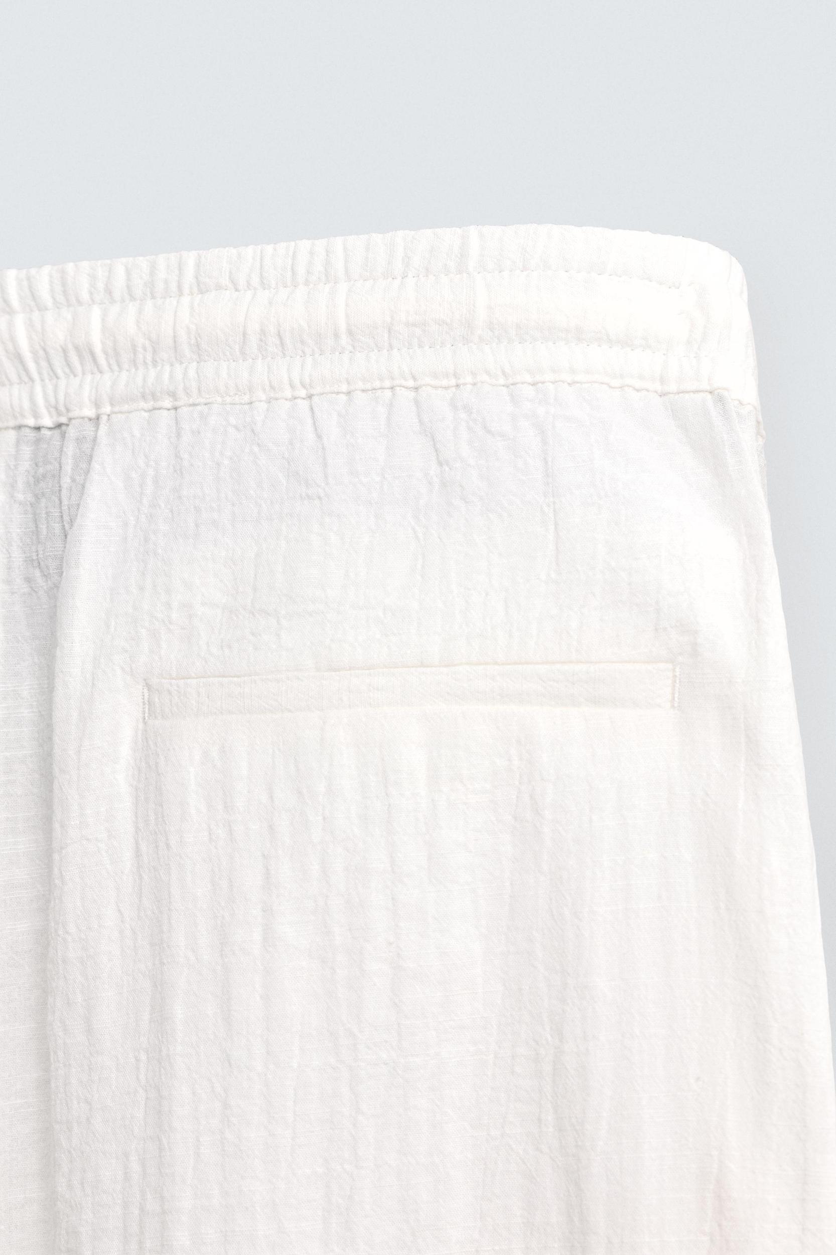 TEXTURED RELAXED FIT PANTS Product Image