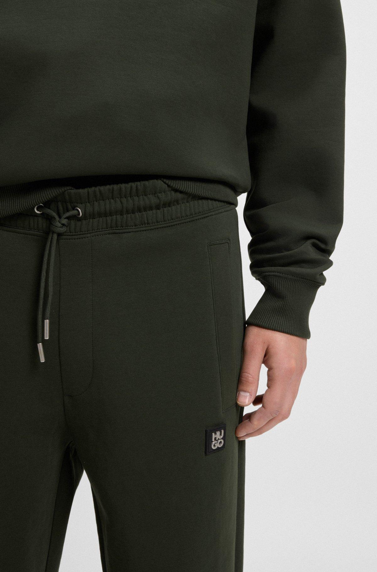 HUGO - Cotton tracksuit bottoms with stacked logo - Dark Green Product Image