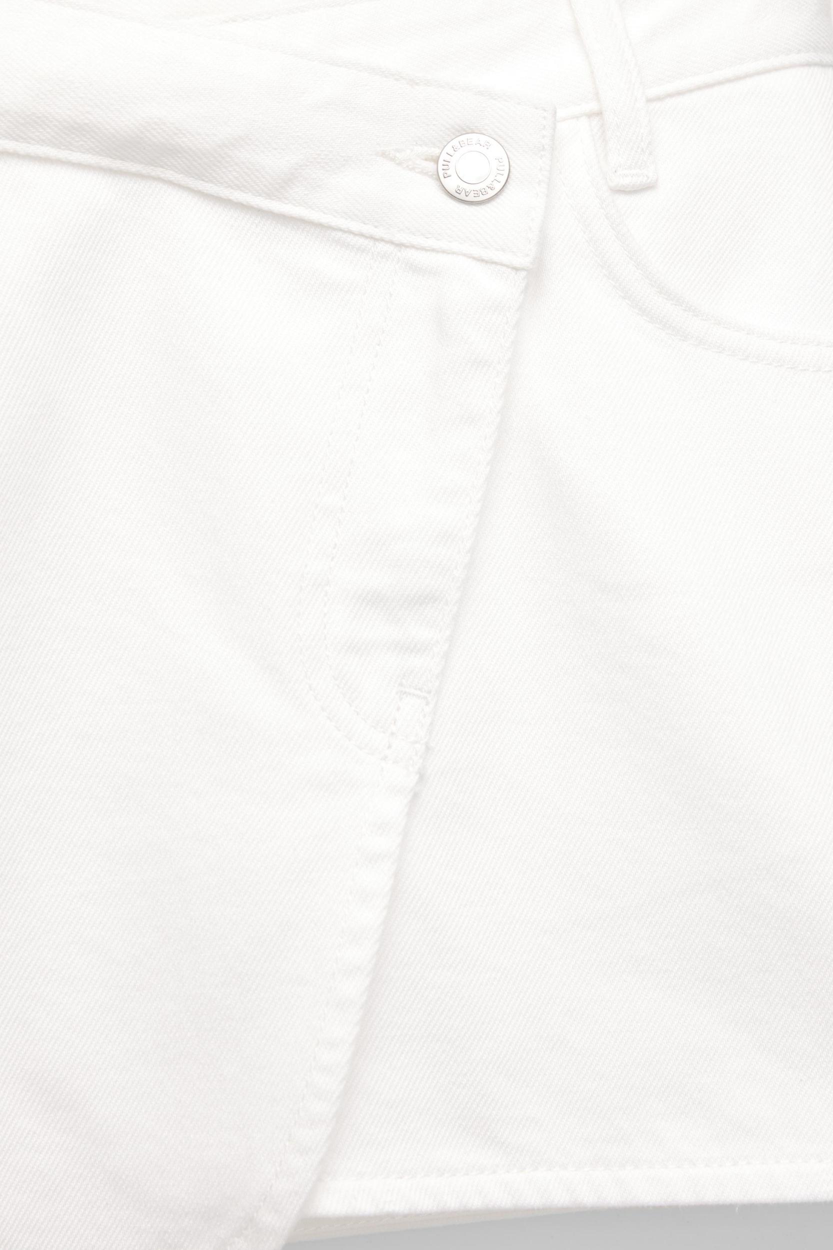 Crossover denim mini skirt Product Image