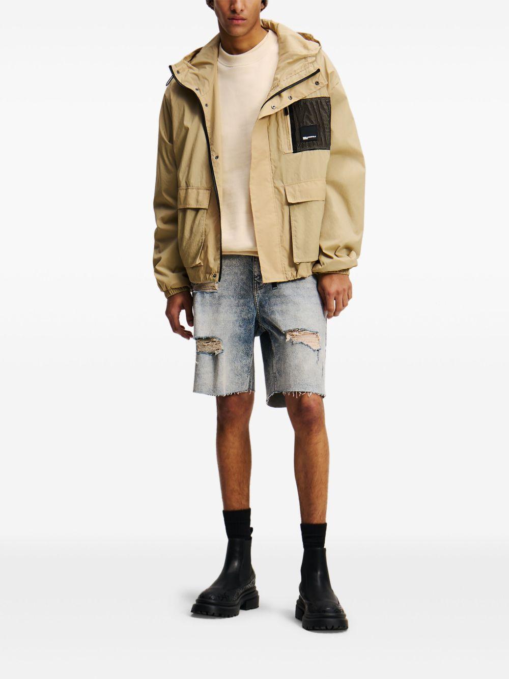 distressed relaxed denim shorts Product Image