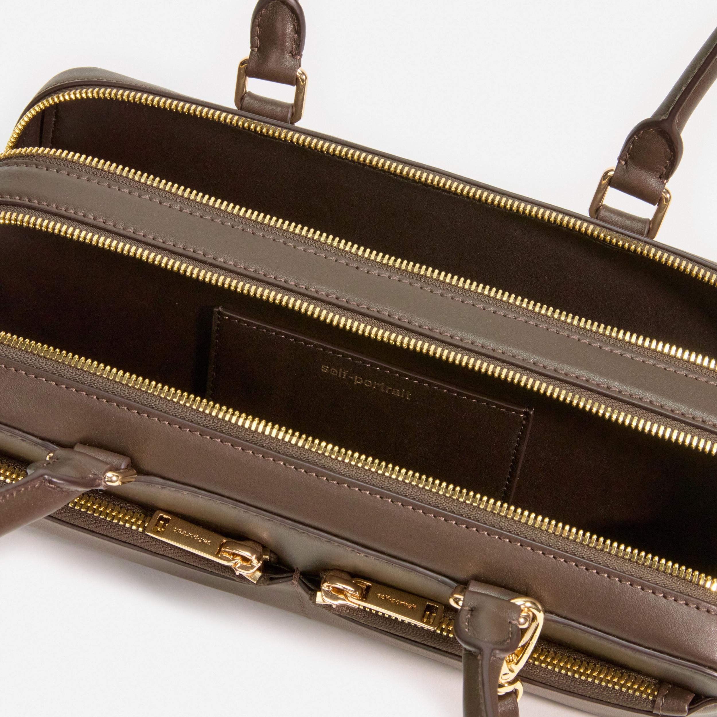 Brown Leather Baguette Shoulder Bag With Charm Product Image