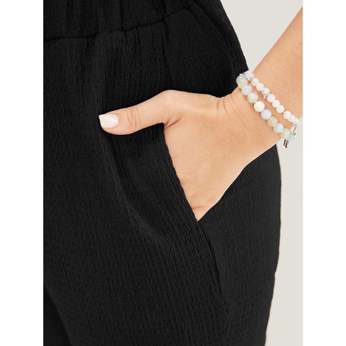 Plus Size Solid Textured Elastic Waist Pocket Bootcut Pants Women Black Casual Mid Rise Dailywear Pants BloomChic 26/4X Product Image