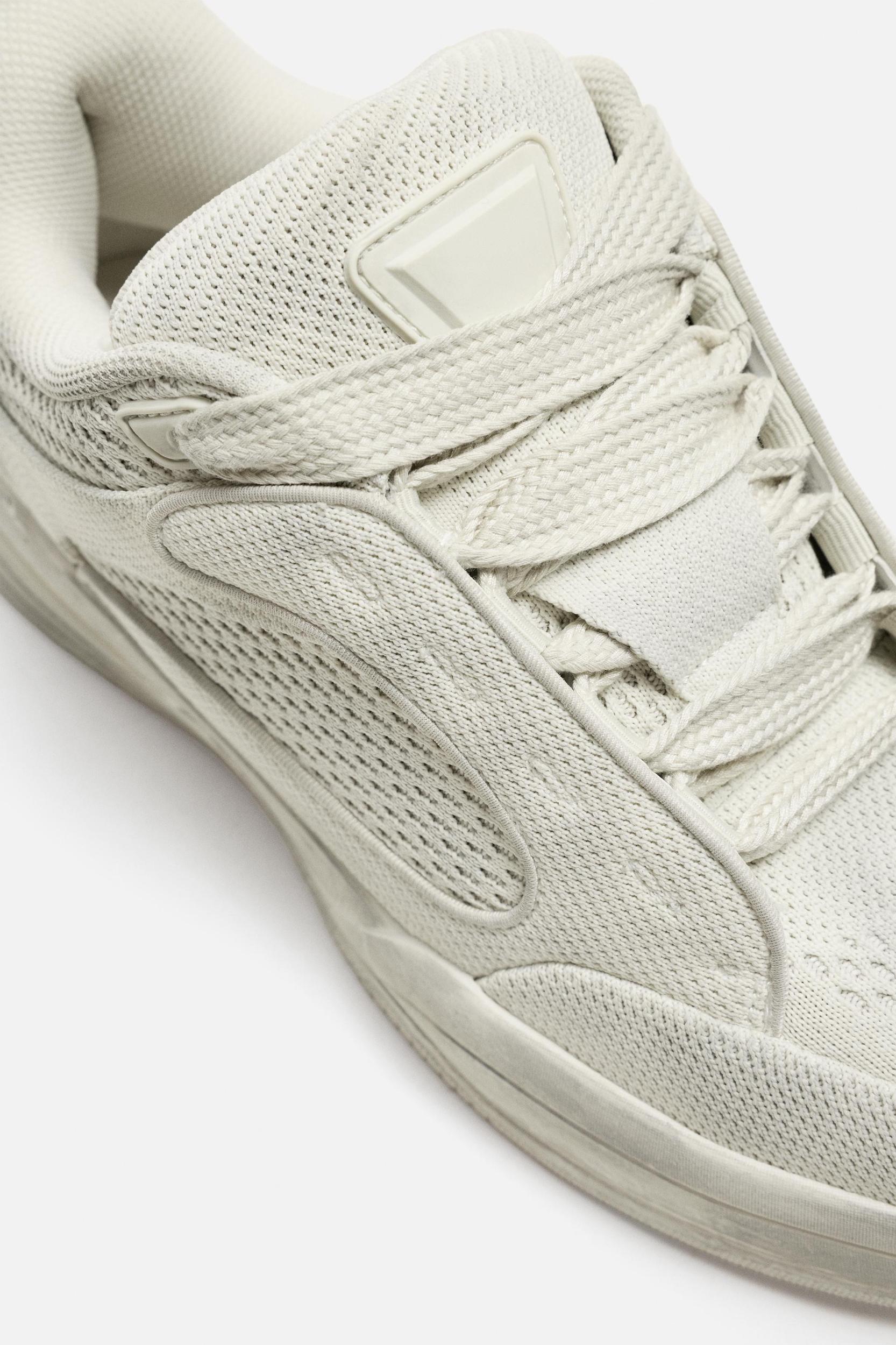 DISTRESSED THICK-SOLED SNEAKERS Product Image