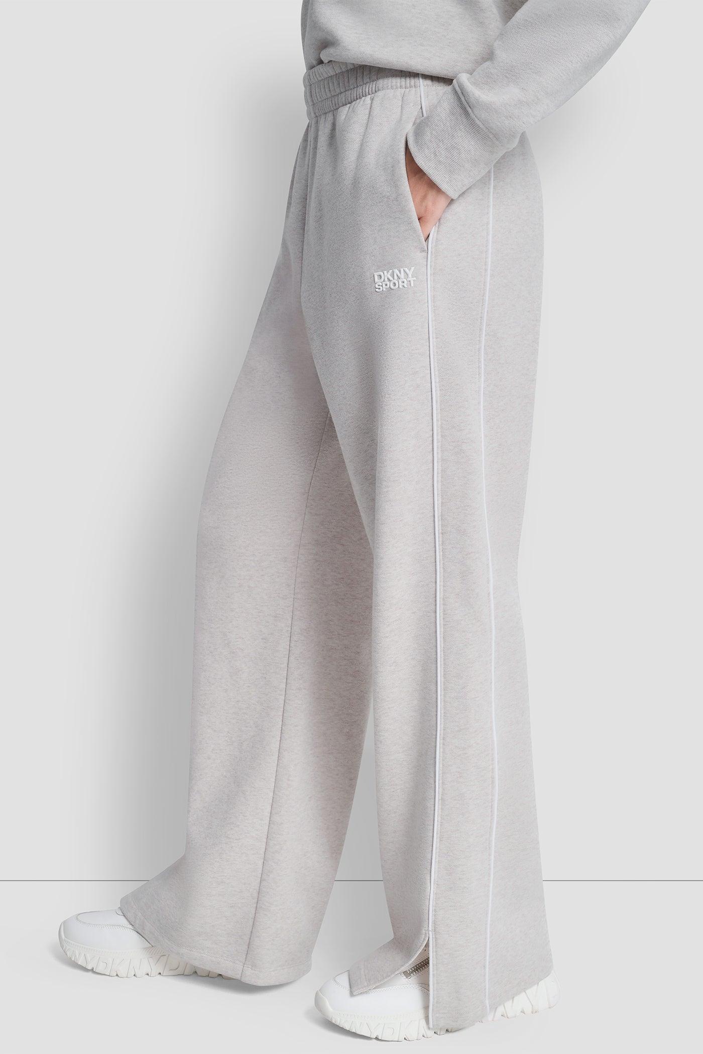 HIGH-RISE PIPED TRACK PANTS Product Image