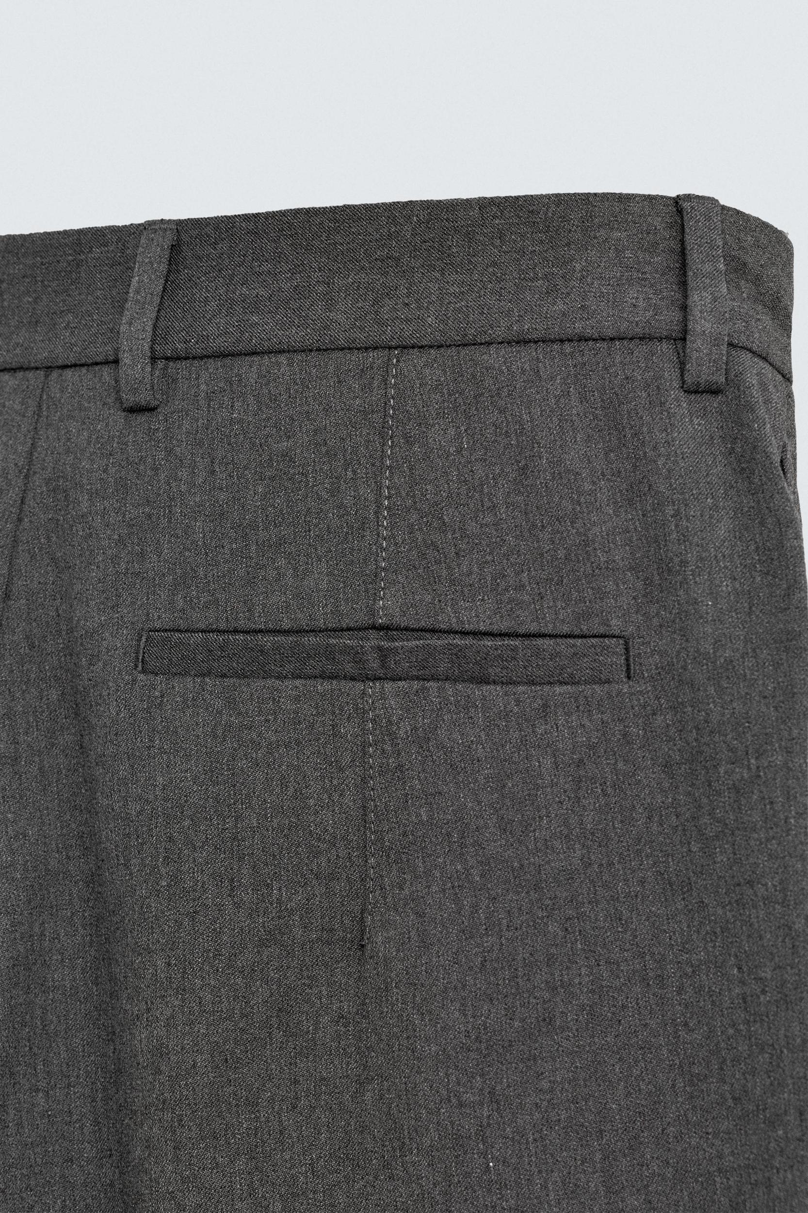 PLEATED WIDE FIT PANTS Product Image