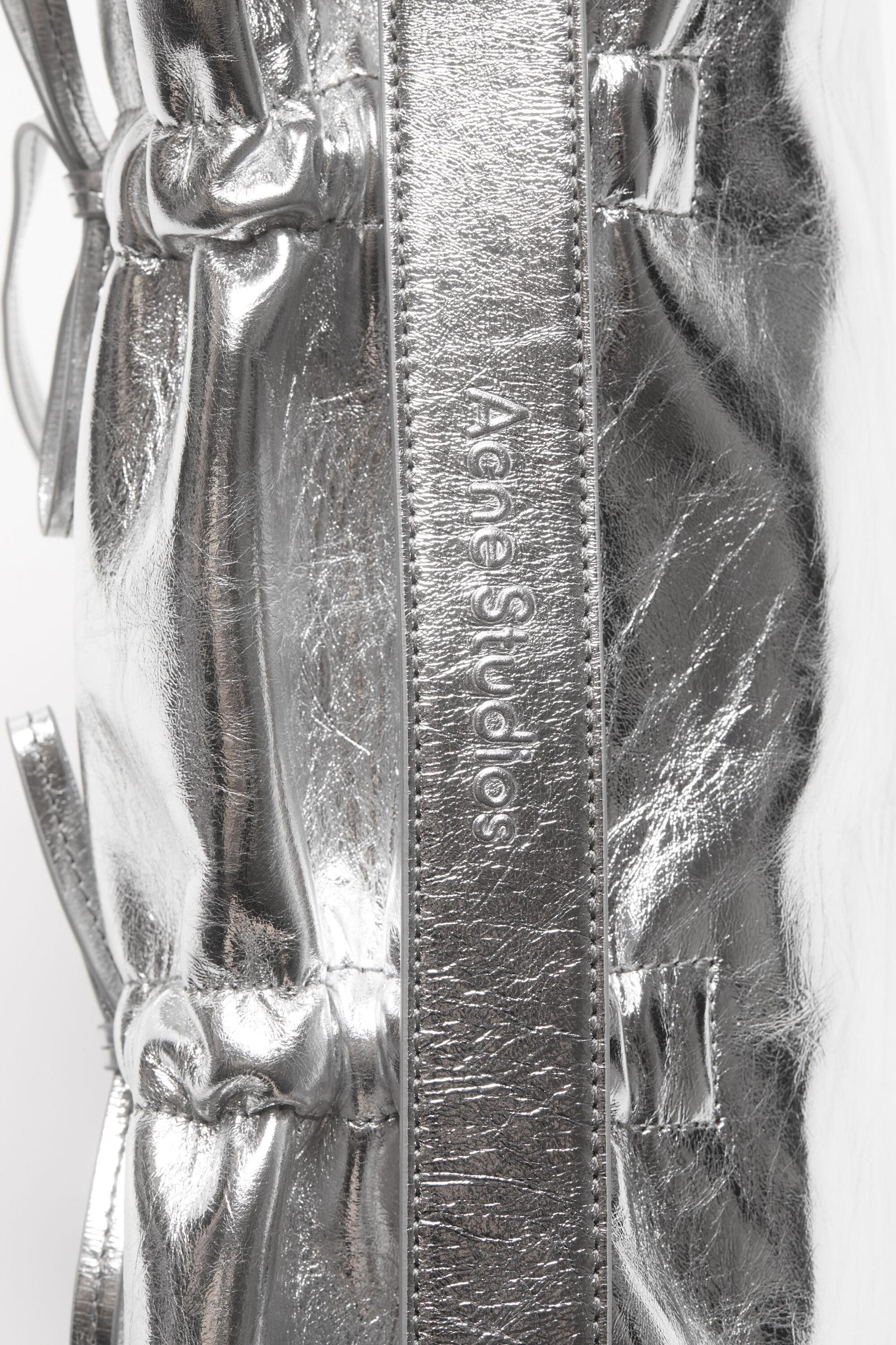 Multipocket metallic leather bag Product Image