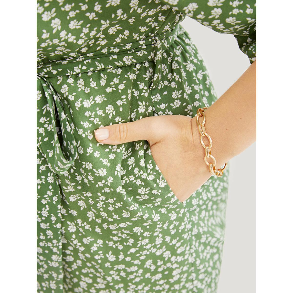 Plus Size Green Ditsy Floral Wrap Pocket Belt Batwing Sleeve Jumpsuit Women Elegant Half Sleeve V-neck Dailywear Loose Jumpsuits BloomChic 22-24/3X Product Image