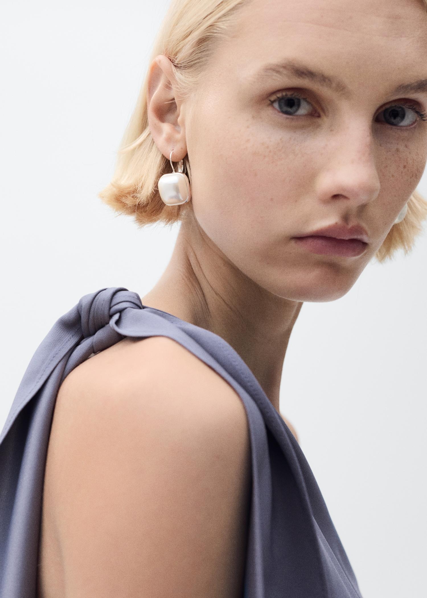 Asymmetrical satin jumpsuit with bow - Women | MANGO USA Product Image